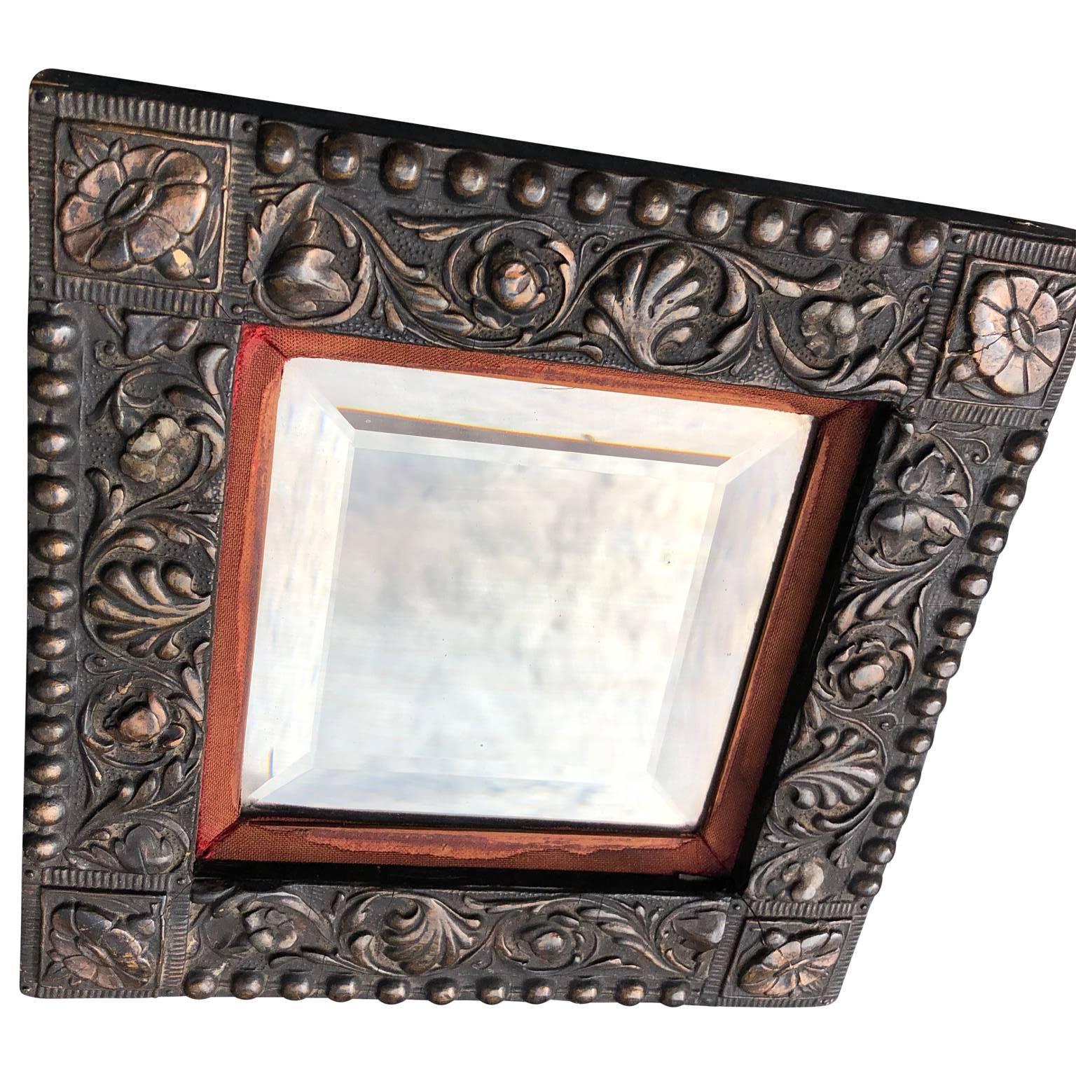 Small 19th Century Metal-framed Mirror with original bevelled mirror glass