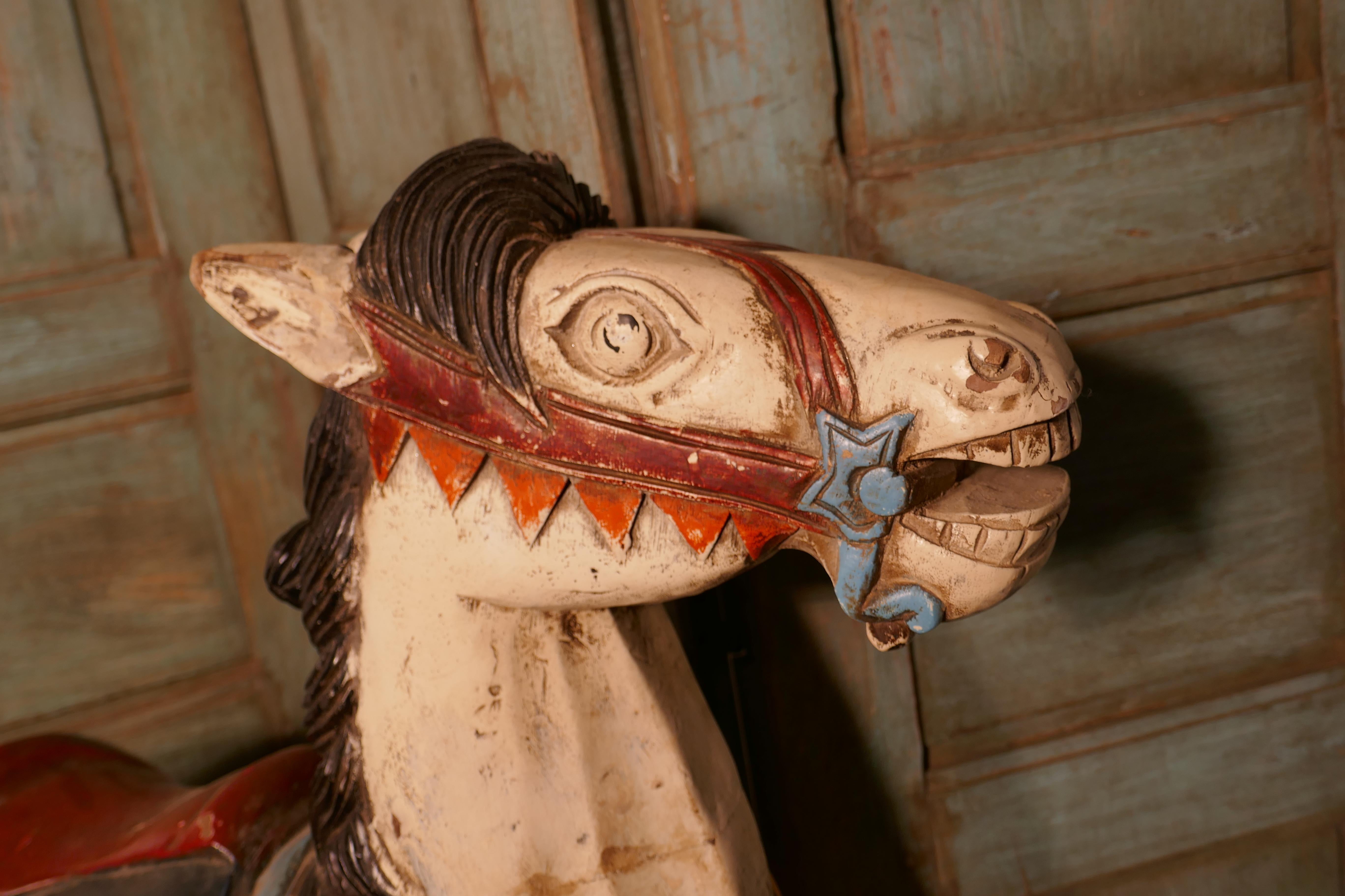 small wooden carousel horse