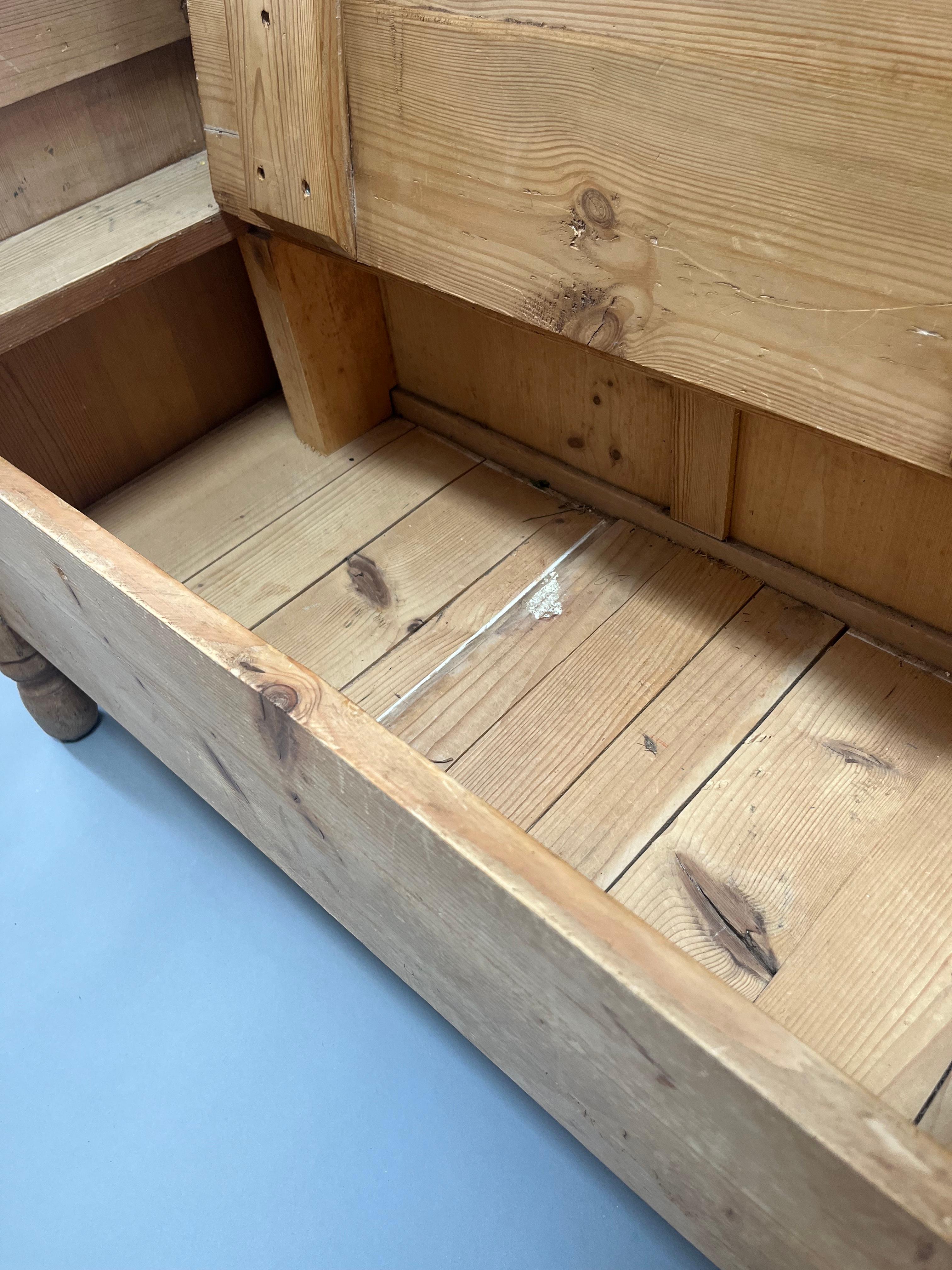  Small 19th Century Scandinavian Pine Settle,  Unusual small size with Arched paneled back over lift up seat for storage. Made in Sweden circa 1840