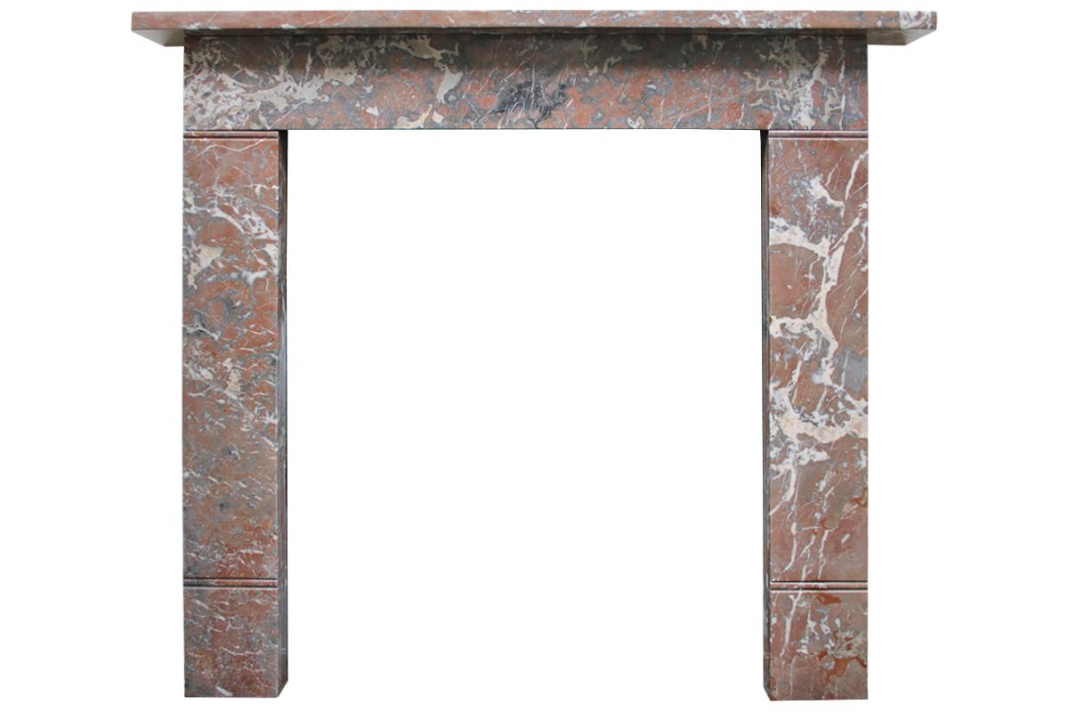 Small 19th century Victorian Rouge marble fireplace surround of simple construction and good color that would sit well within both traditional and contemporary interiors.

Pictured here with an original William IV cast iron hob grate, sold