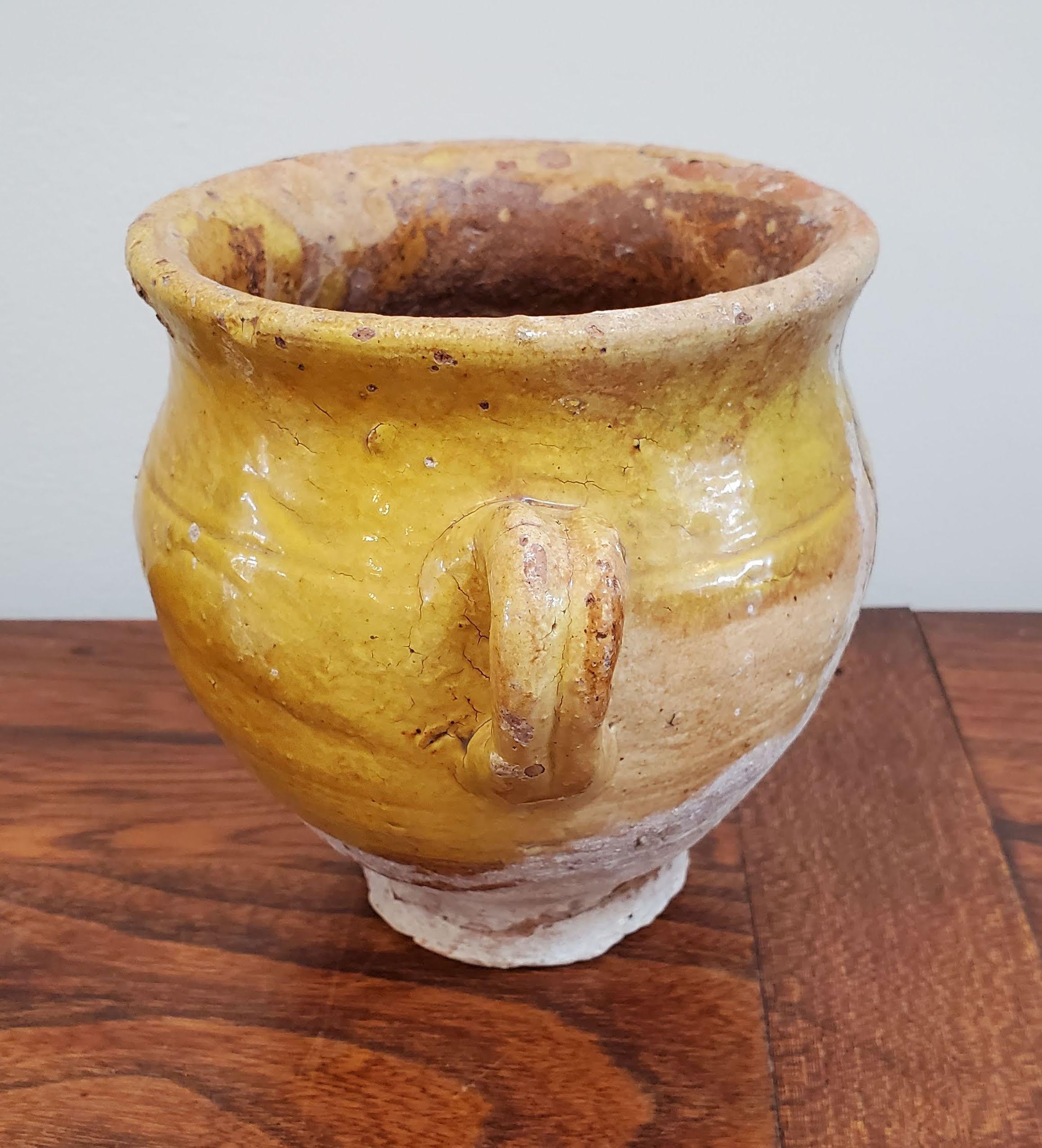 Unusually small 19th century Yellow Glazed Terra Cotta “Confit” Pot. 
A confit pot this small is rare. 
Provence, circa 1880.
Measures: 5” H, 5” Dia
   