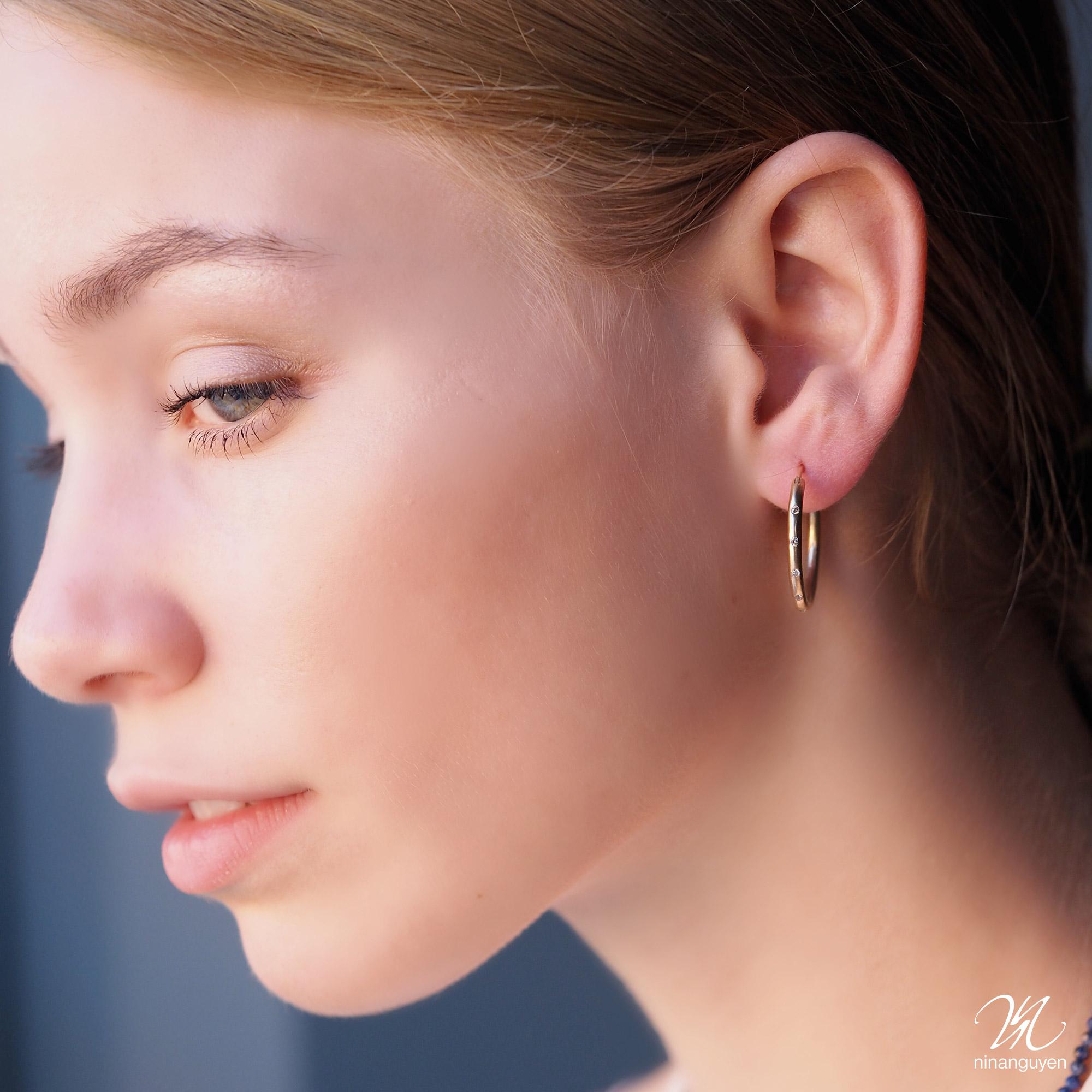 These diamond-studded Small 25mm Gold Hoops are made for dangling a custom-curated batch of your favorite jackets but go ahead and wear them on their own if you want to. They’ll get attention either way.  

Diamond carat: 0.35
Size: 25mm