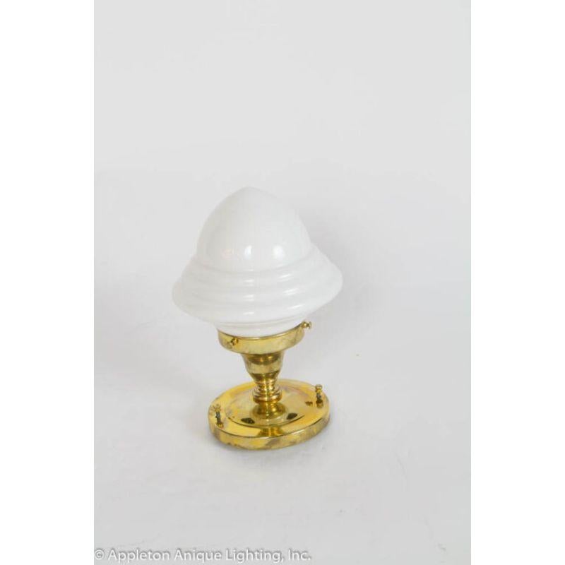 Brass fixture with milk glass shade 3 1/4 fitter. Late 20th Century. Excellent Condition

Material: Brass,Glass
Style: Traditional,Transitional
Place of Origin: United States 
Period Made: Late 20th Century
Dimensions: 7 × 7 × 9 in
Condition