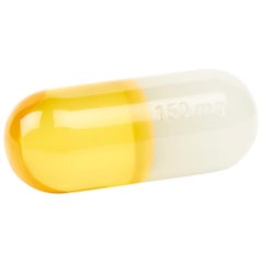 Petit pilulier en acrylique blanc et jaune