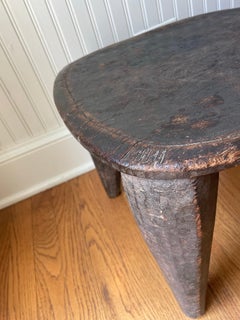 Small African Senufo stool made from one piece of wood