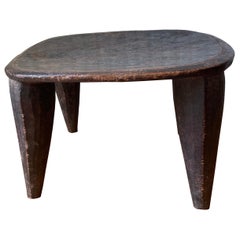Small African Senufo stool made from one piece of wood