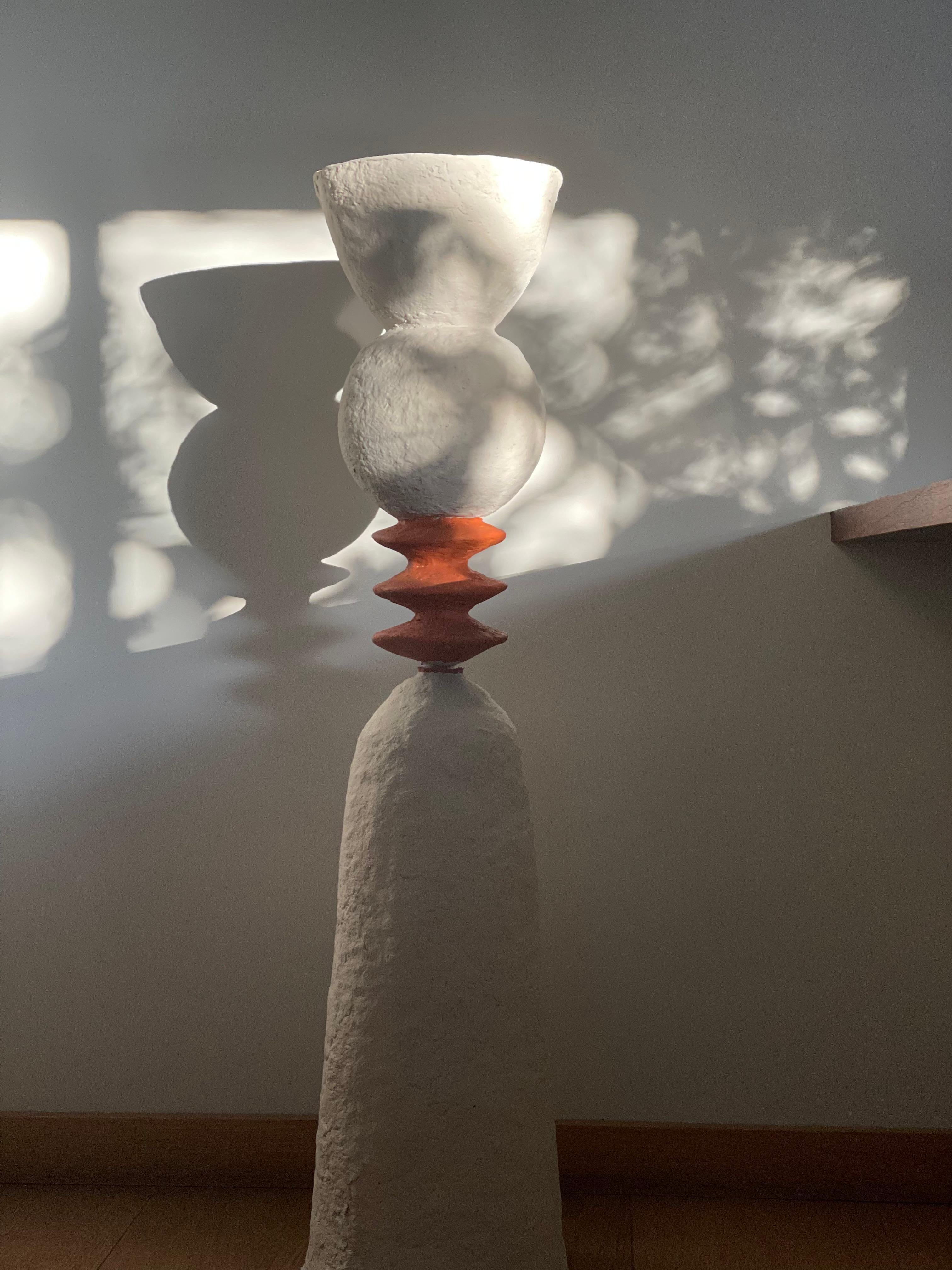 Piccolo Totem Ama di Ana Tron.
Edizione limitata di 5 esemplari
Dimensioni: D. 25 x H. 125 cm
Materiali: Carta riciclata con pasta, gesso e vernice opaca a base d'acqua.

Ana Tron è una designer d'interni e un'ambientalista imperfetta.

In tempi