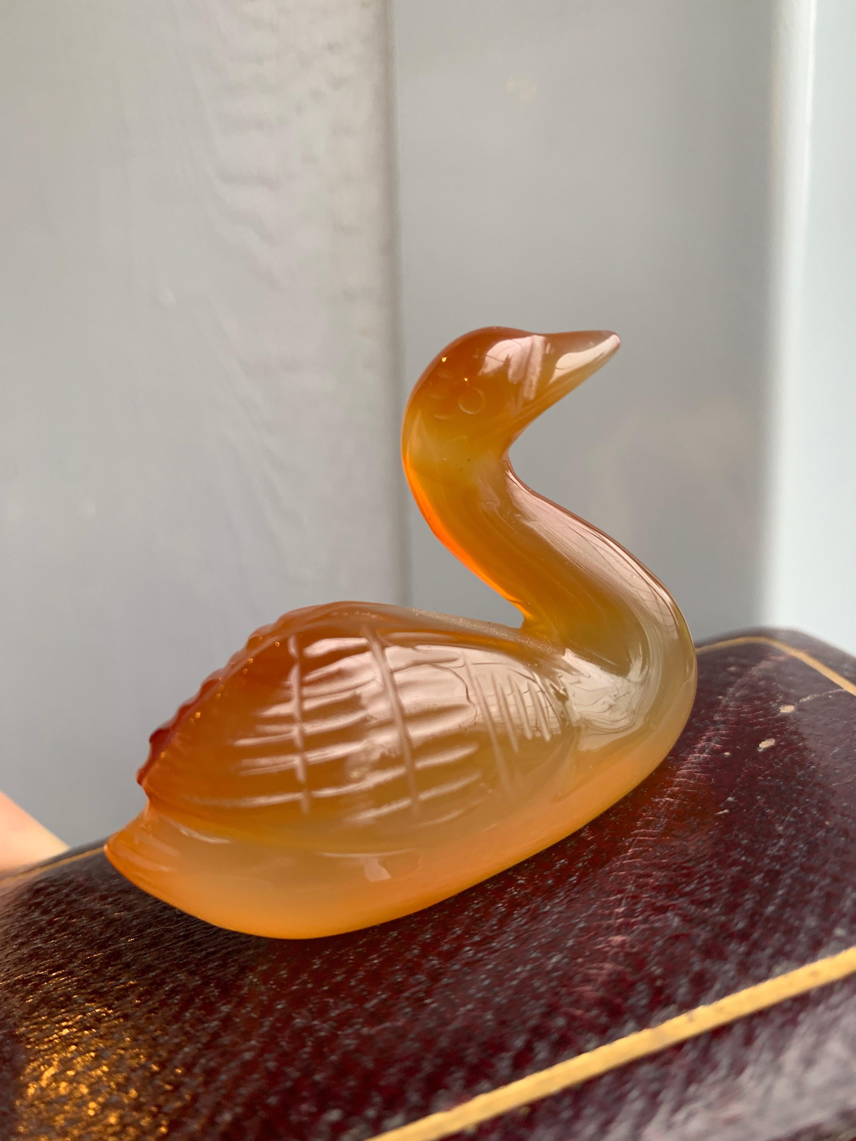Late 19th Century Small Amber Chinese Decorative Swan on a Wooden Stand