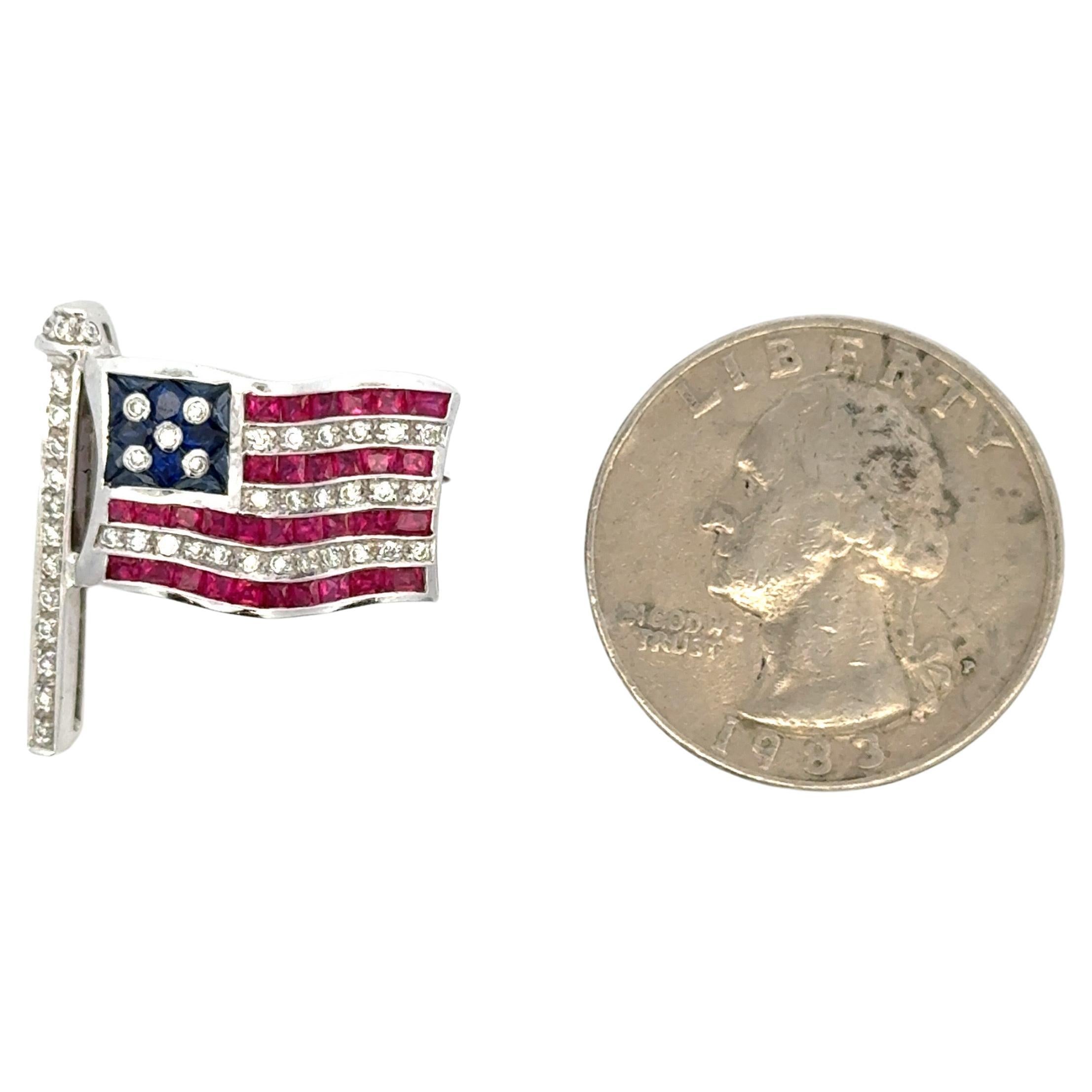 American flag brooch featuring Ruby, Sapphire and Diamonds crafted in 18 Karat White gold.
Larger version available.