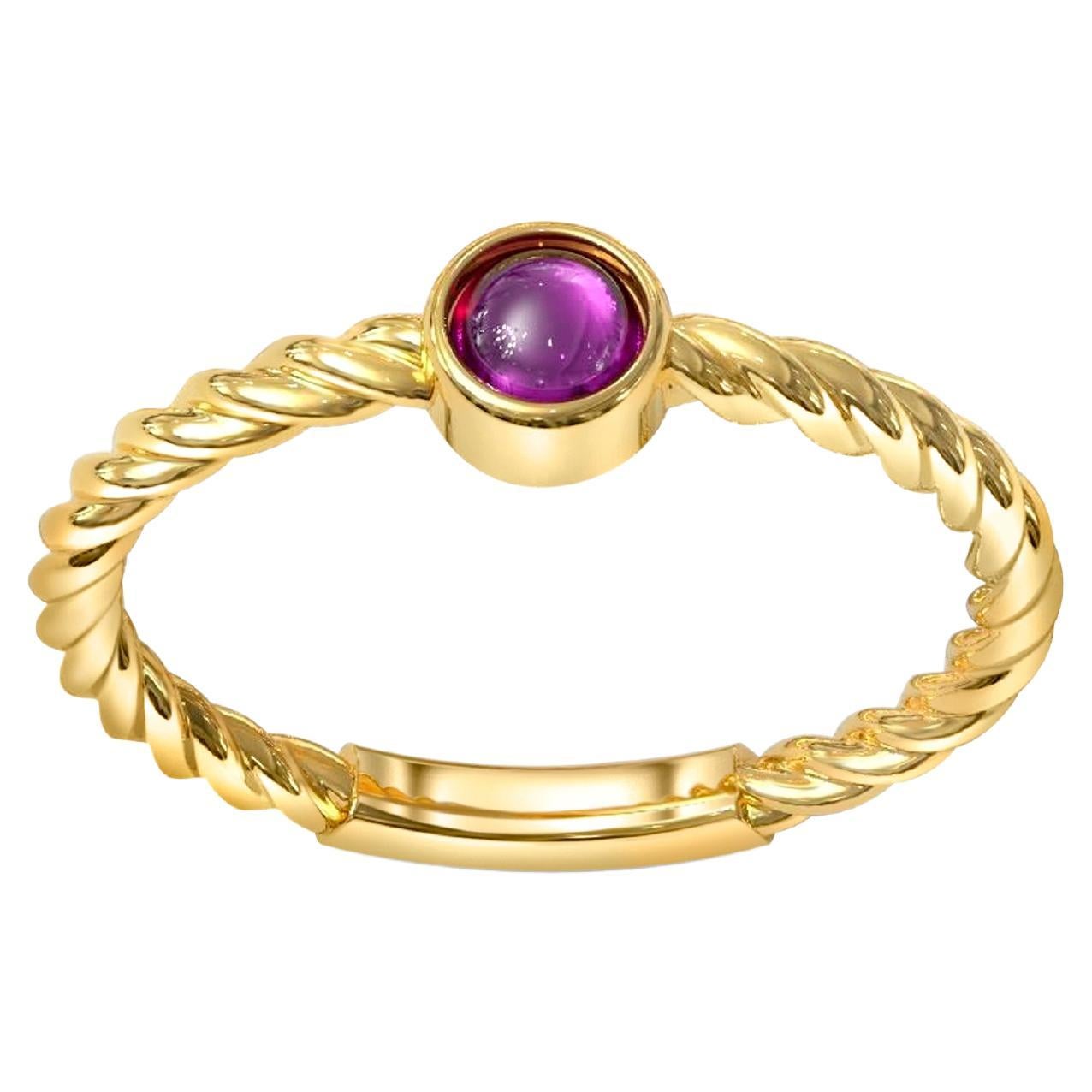 Small amethyst cabochon 14k gold ring.