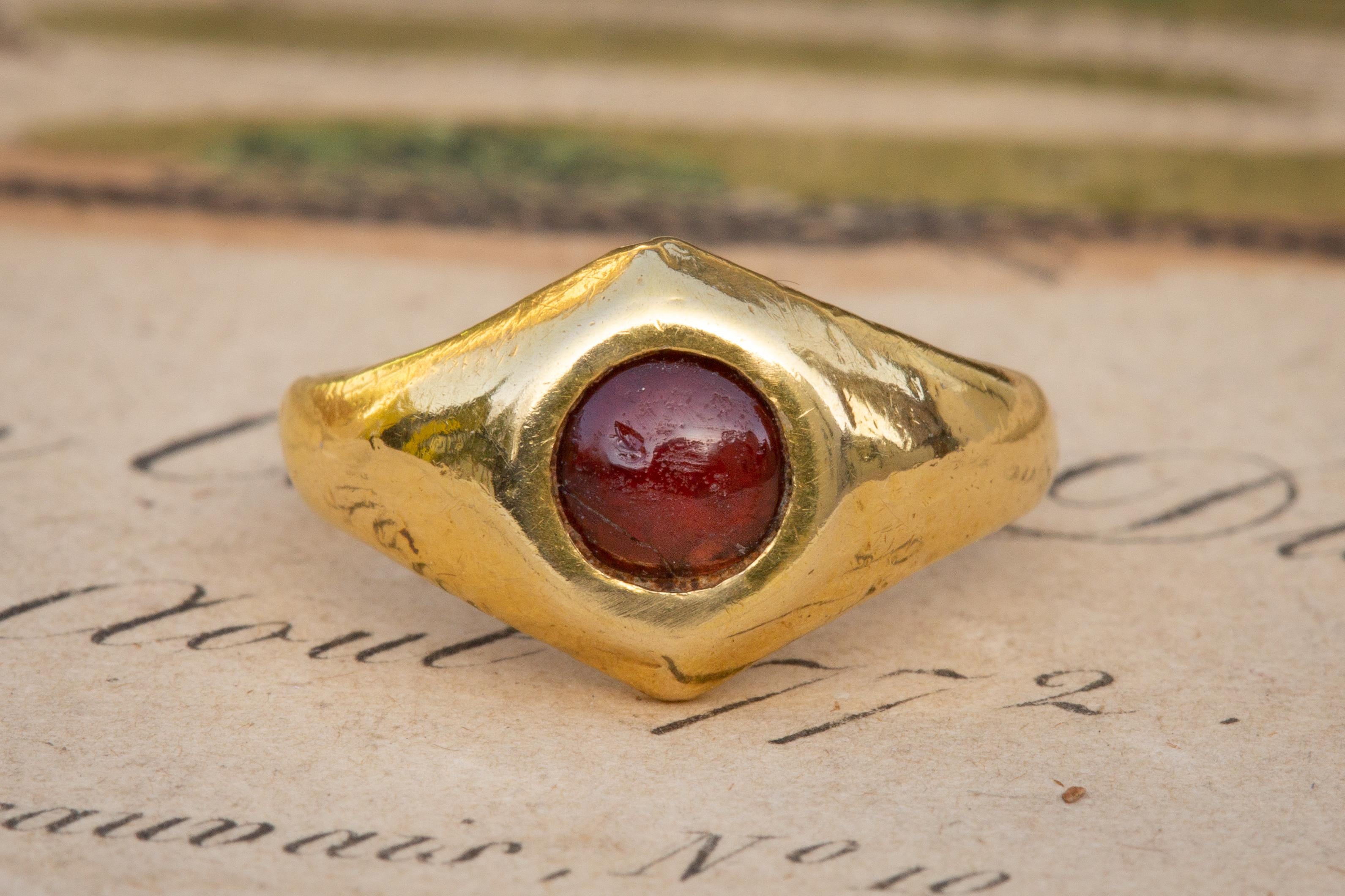 Women's Small Ancient Roman Period Gold Garnet Cabochon Ring Antique  For Sale