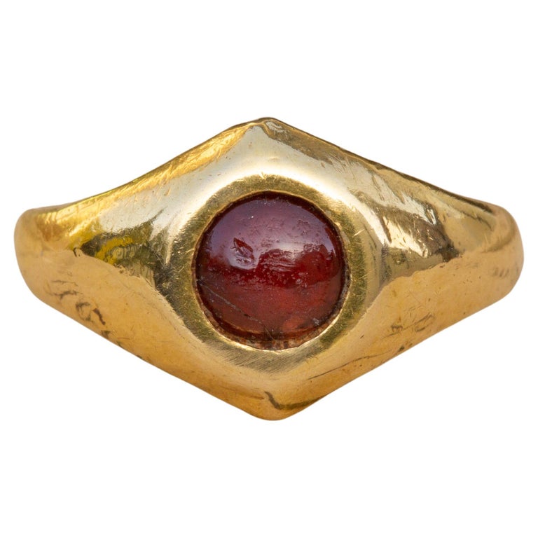 Small Ancient Roman Period Gold Garnet Cabochon Ring Antique  For Sale