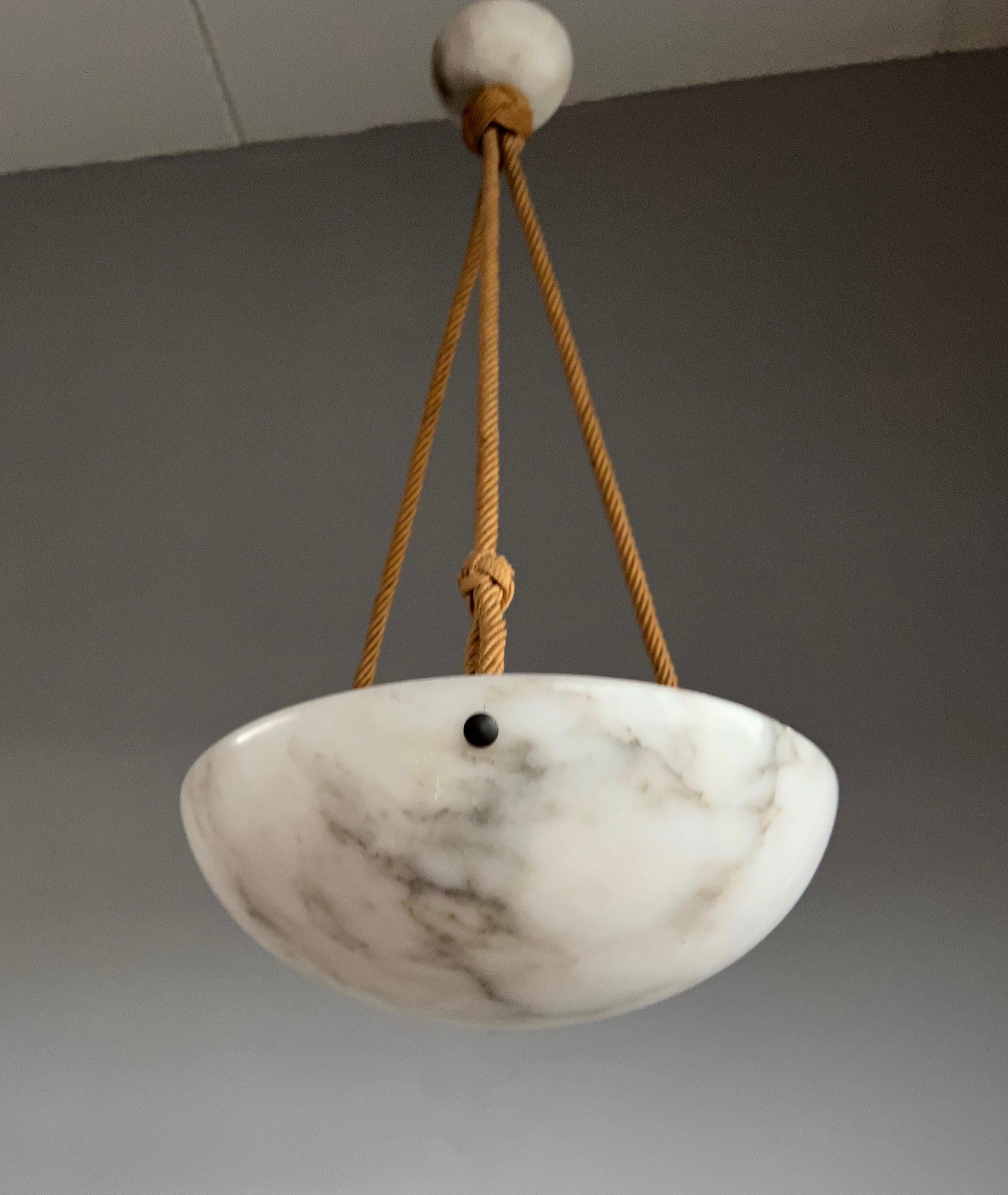 Marvelous antique light fixture for an entry hall, bedroom or any other small room.

With early 20th century light fixtures being one of our specialities, we always love finding timeless pendants. This particular work of beauty comes with a very