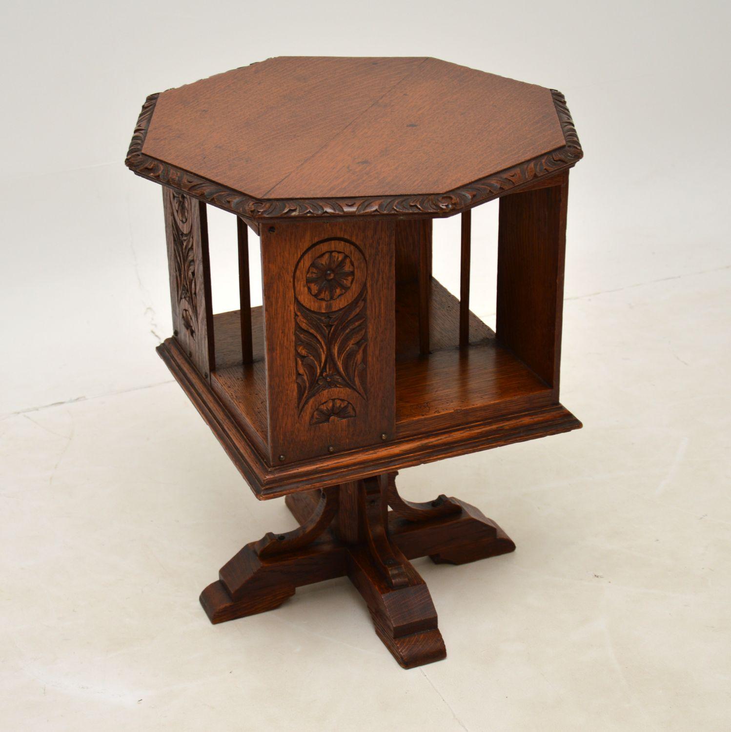 A wonderful small antique Arts & Crafts period revolving bookcase stand in solid oak, dating from around the 1890-1900 period.
It is very well made, is of super quality and is a very useful size. It’s solid oak throughout, with fine carving and a