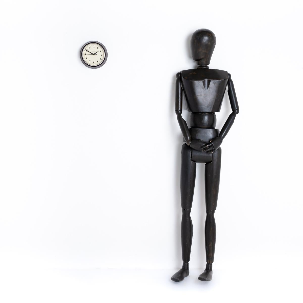 SMALL VINTAGE FACTORY WALL CLOCK BY SMITHS

A stunning find from a Brick Factory in Wales, upon conversion to living accommodation a bricked up store was discovered where 12 clocks were found. Of those 12, nine were identical Smiths English Clock