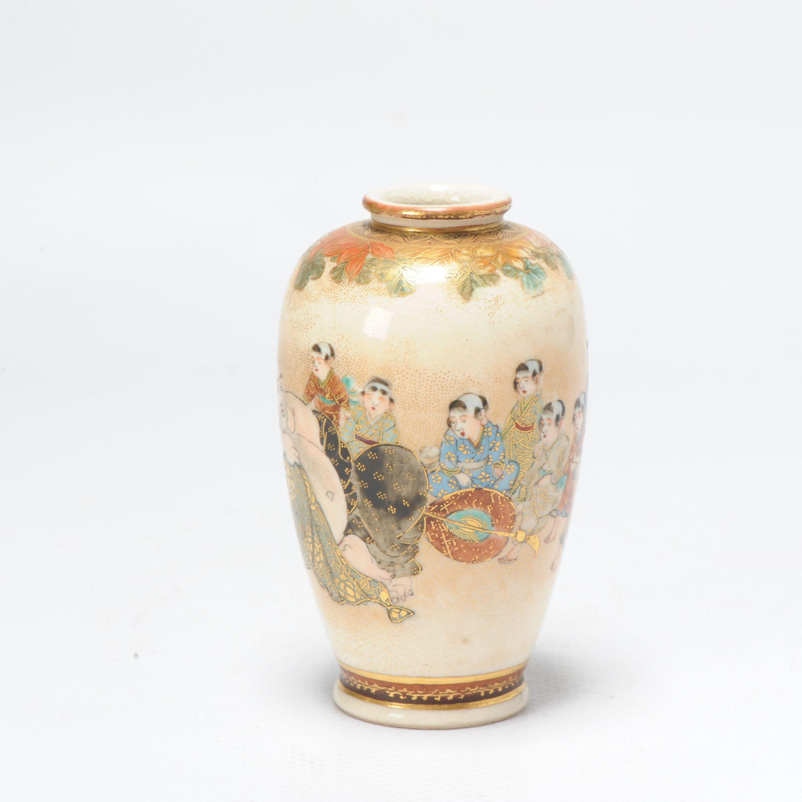 Ovoid vase depicting Hotei slumped against his sack in the company of several karako (Chinese boys), signed Dozan, 9cm (3½in) high;

Additional information:
Material: Porcelain & Pottery
Region of Origin: Japan
Period: 19th century Meiji Periode