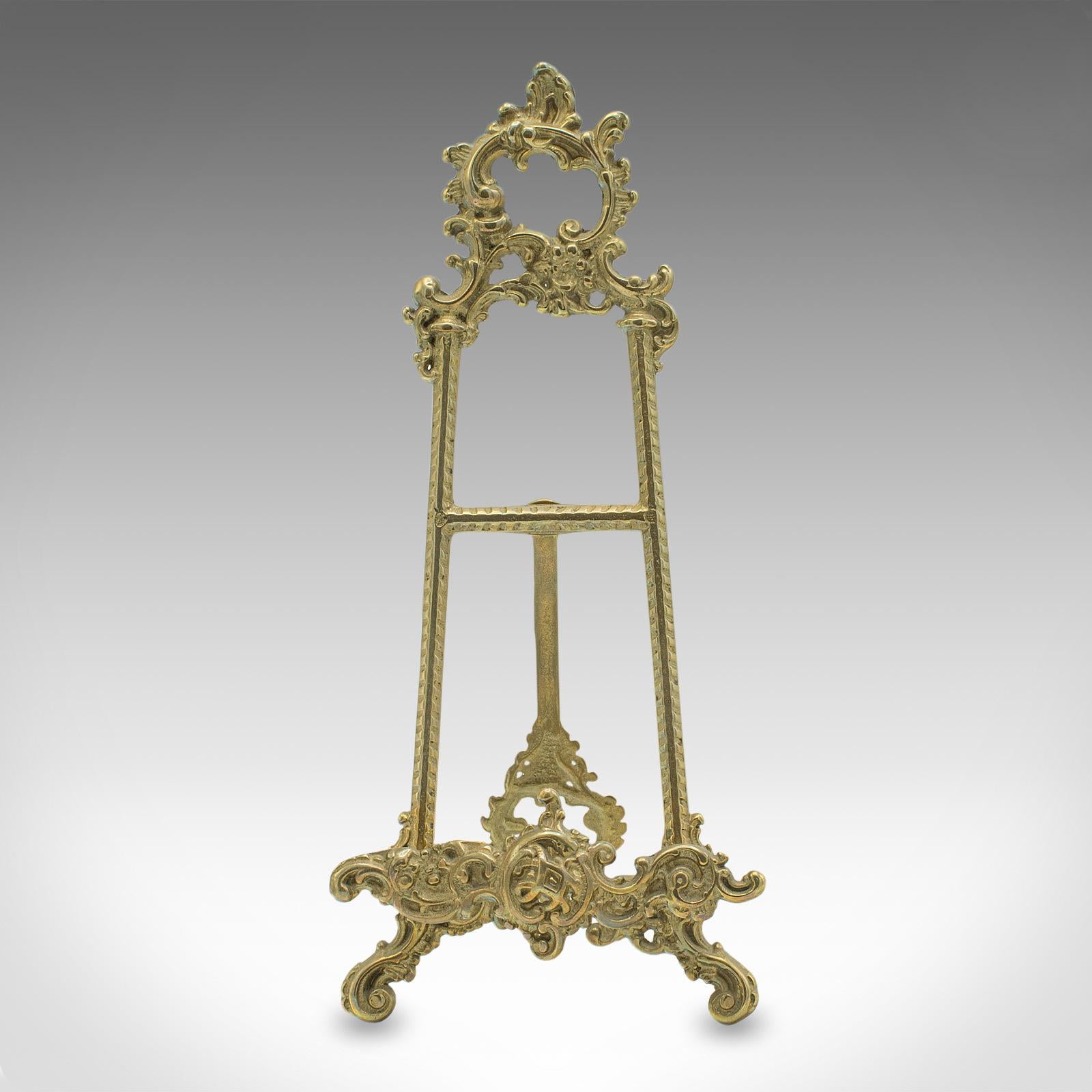 This is a small antique bedside picture stand. An English, brass novel rest in Art Nouveau taste, dating to the early 20th century, circa 1920.

A delightful way to host a picture of a loved one on your nightstand
Displays a desirable aged patina