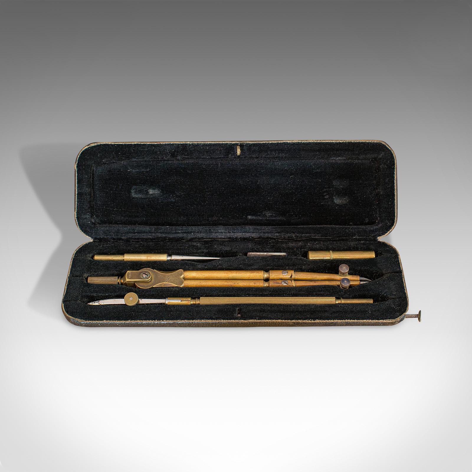 This is a small antique cartographer's tool set. A German, brass draughtsmen's instrument case by Riefler, dating to the late 19th century, circa 1900.

Wonderfully compact set for the travelling cartographer
Displays a desirable aged