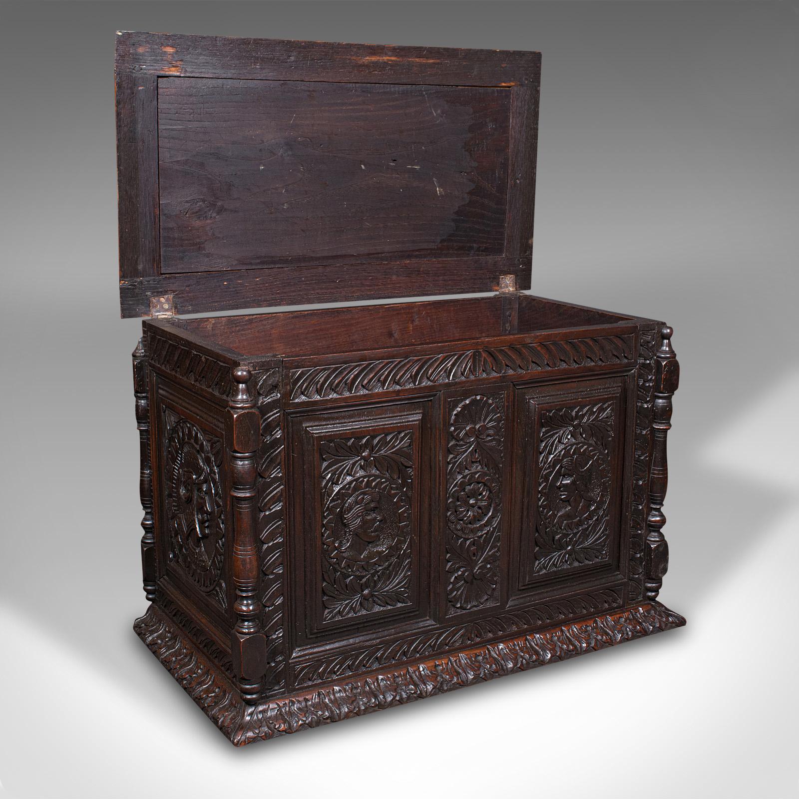 This is a small antique carved coffer. An English, oak blanket box with Gothic revival taste, dating to the Victorian period, circa 1880.

Exuberant display of carved craftsmanship, with appealing proportion
Displaying a desirable aged patina and in