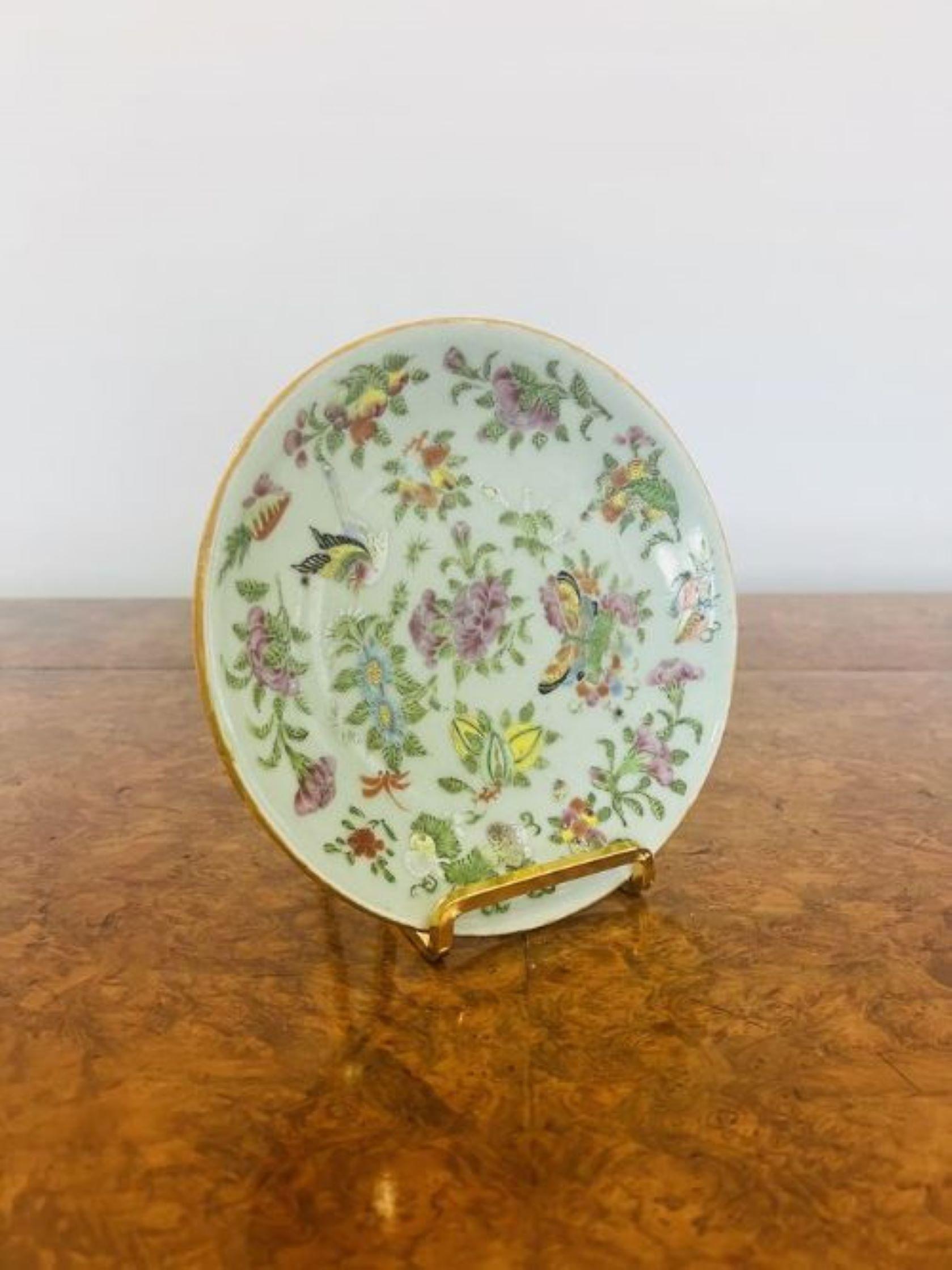 Small antique Chinese Celadon Famille vert plate having a lovely small antique Chinese plate hand painted with wonderful flowers, birds and insects in stunning green, yellow, pink and blue colours. 

D. 1830