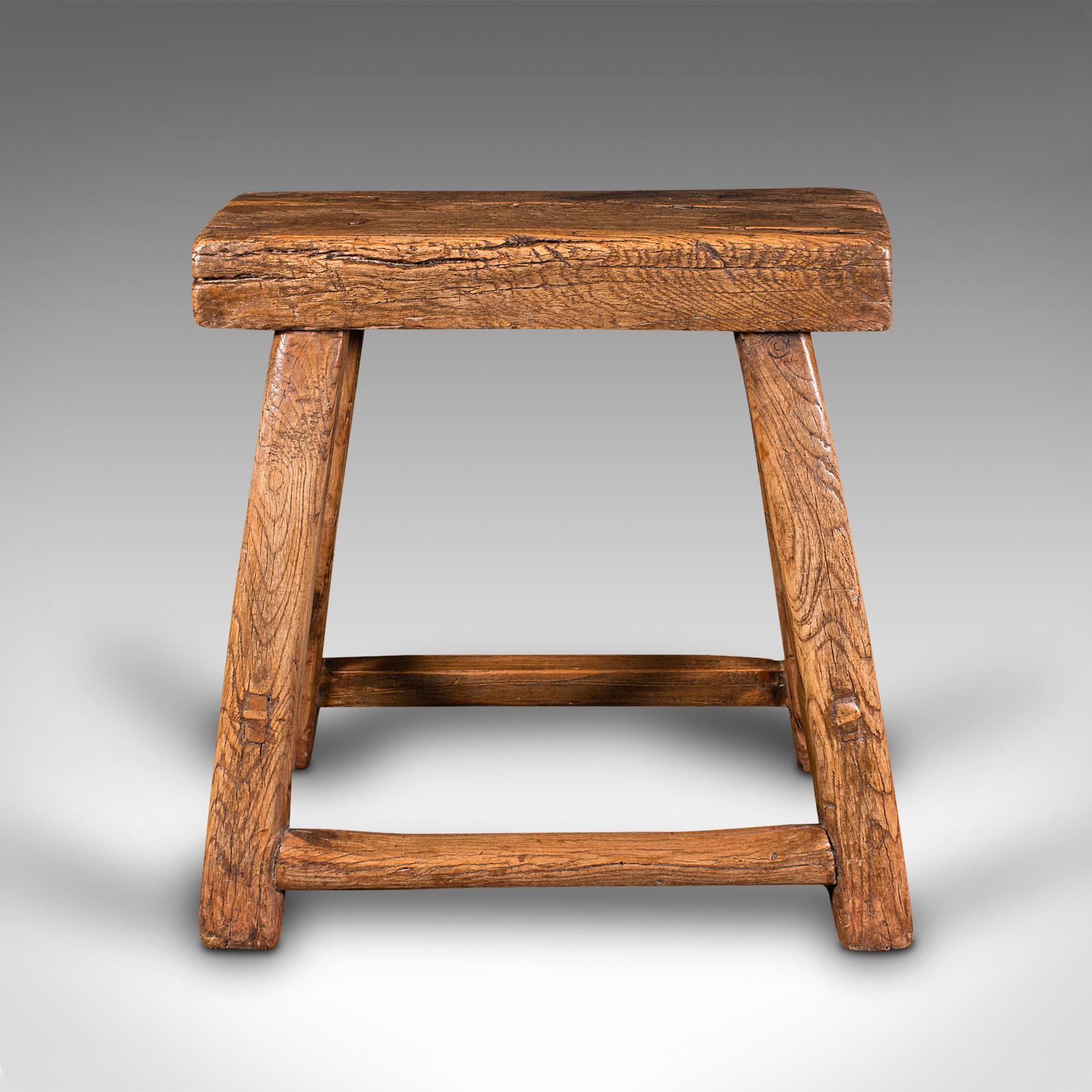 This is a small antique craftsman's stool. An English, rustic oak work seat in Provincial taste, dating to the Georgian period, circa 1800.

Graced with an abundance of rustic charm and character
Displays a desirable aged patina in original