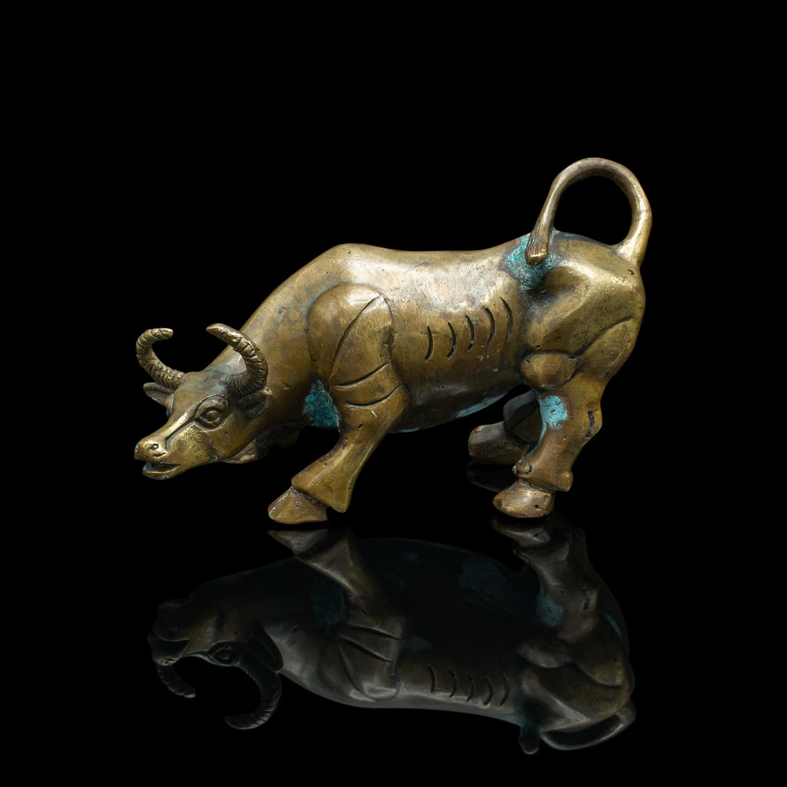 This is a small antique decorative water buffalo. A Malayan, bronze figure, dating to the Victorian period, circa 1900.

Distinctive stance with a nicely patinated appearance
Displays a desirable aged patina throughout
Bronze form presents golden