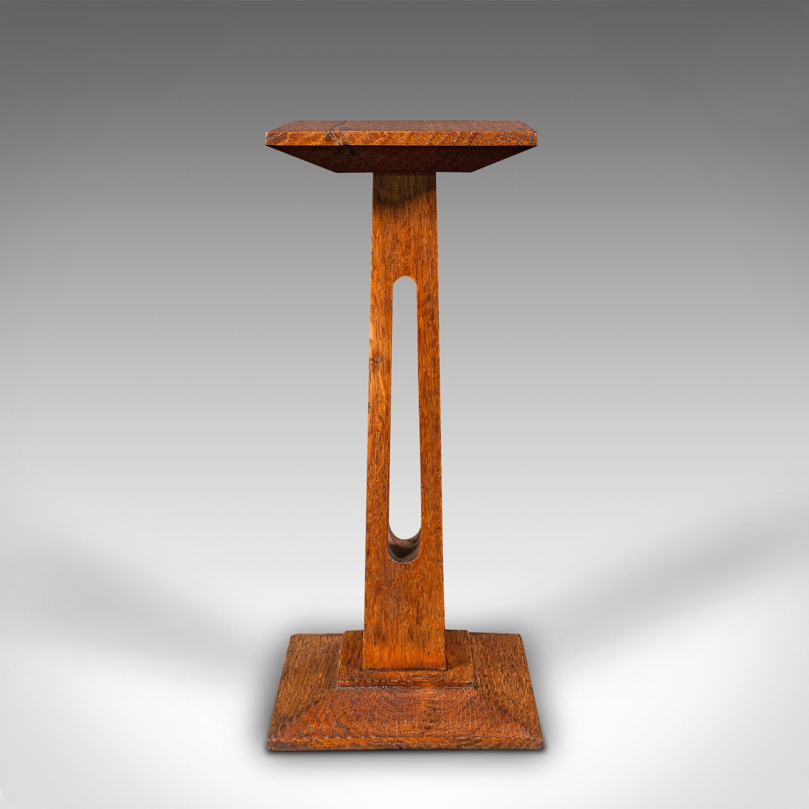 This is a small antique display pedestal. An English, oak jardiniere or bust stand, dating to the late Victorian period, circa 1900.

Appealing Victorian stand, ideal for displaying a small bust or statue
Displaying a desirable aged patina and in