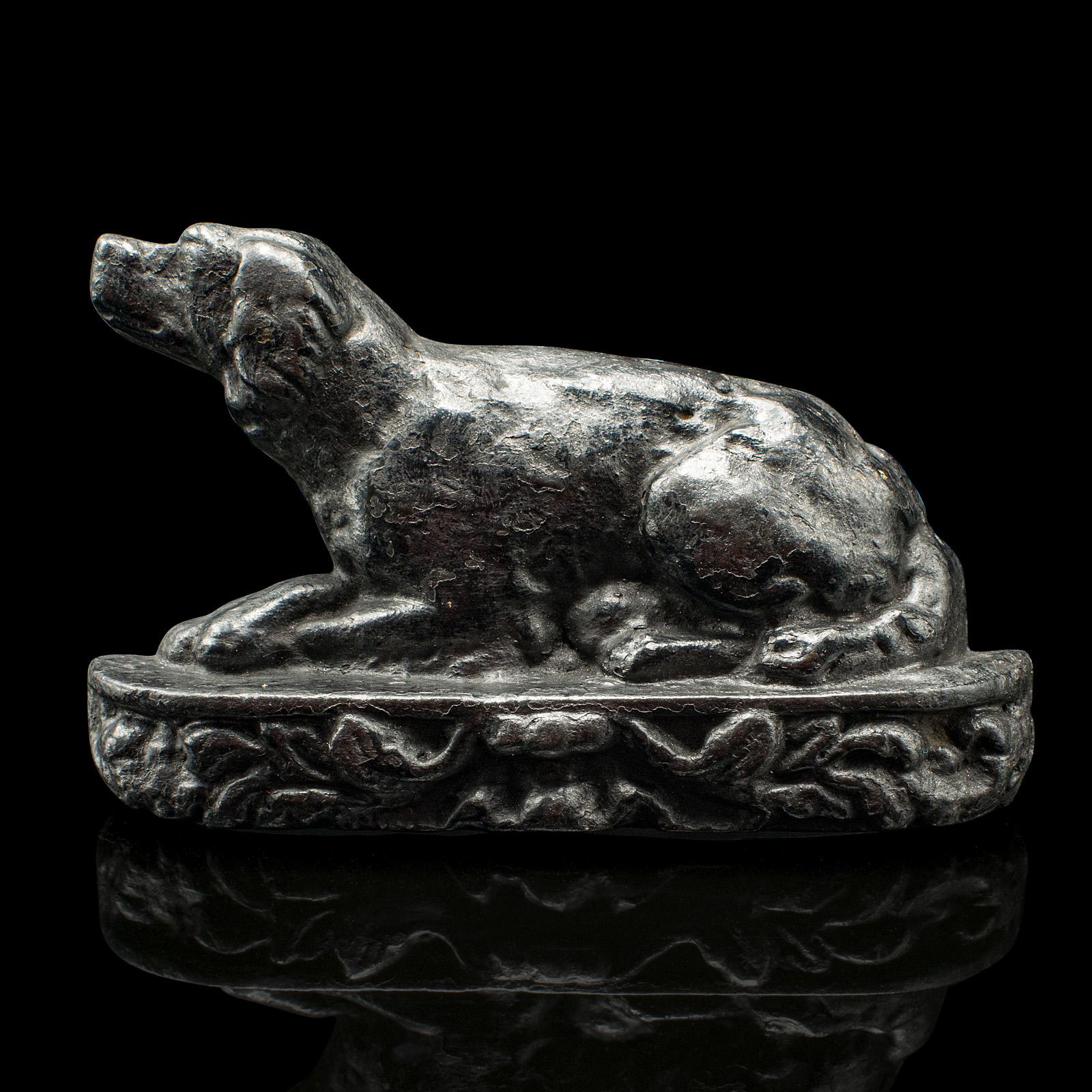 
This is an antique dog door stop. An English, cast iron decorative keeper in Retriever form, dating to the Edwardian period, circa 1910.

Fascinating decorative item, ideal for doorways or mantle interest
Displaying a desirable aged patina and in