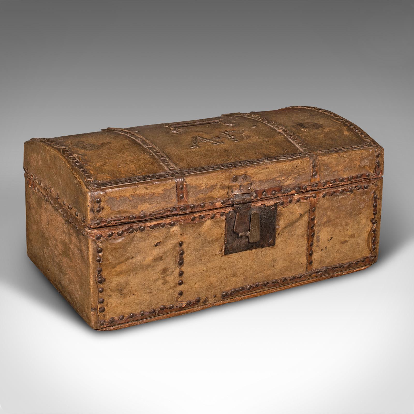 This is a small antique dome-top chest. A Spanish, leather covered decorative trunk, dating to the mid-Georgian period, circa 1750.

Fascinating weathered appearance to this Georgian decorative chest
Displays a desirable aged patina