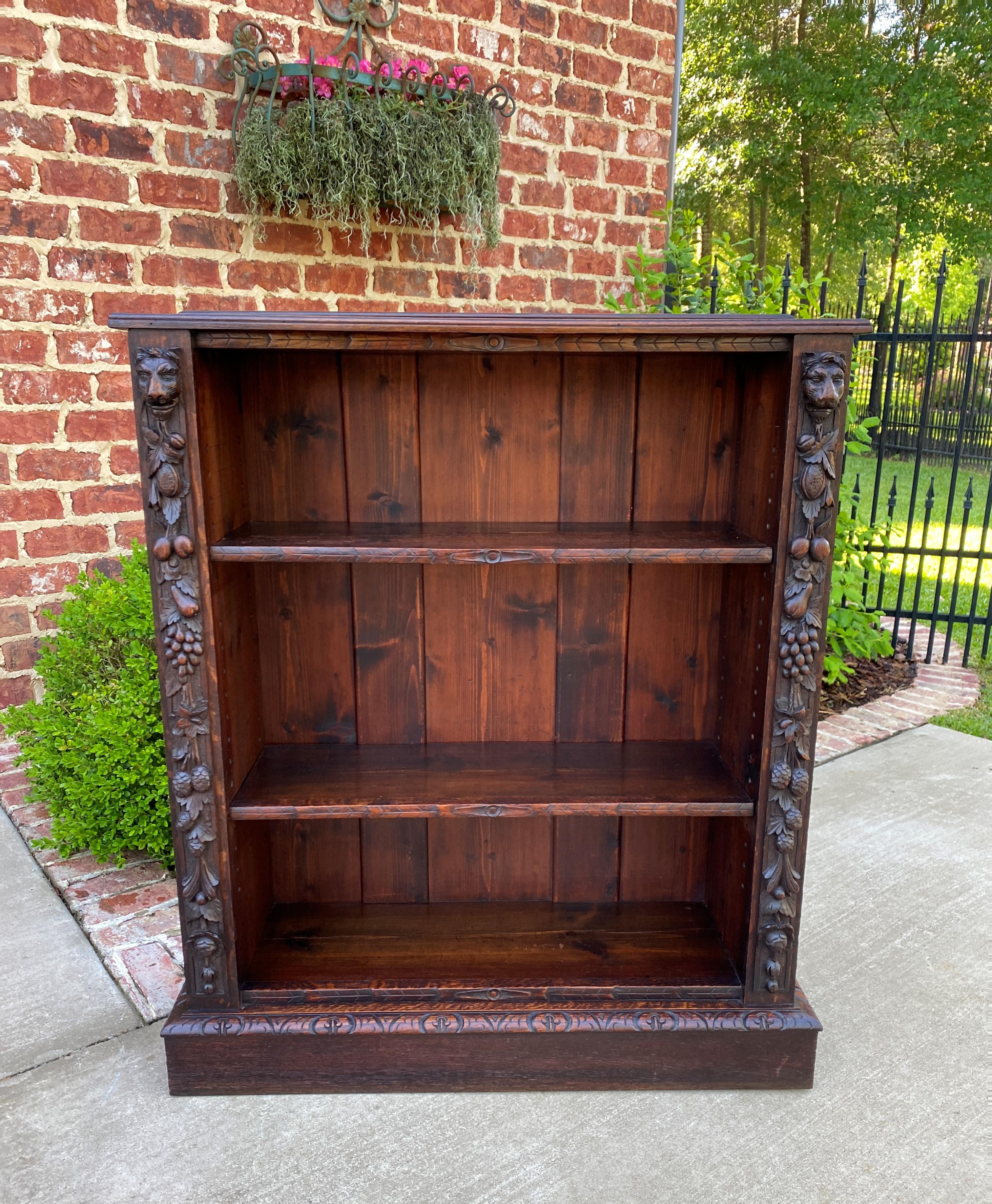 BEAUTIFUL Antique English Oak Freestanding Display Shelf, Cabinet or Bookcase ~~c. 1920s

PERFECT for displaying your favorite antique collectibles or use as a bookcase~~top surface above shelves is flat for additional display~~carved lion masks,