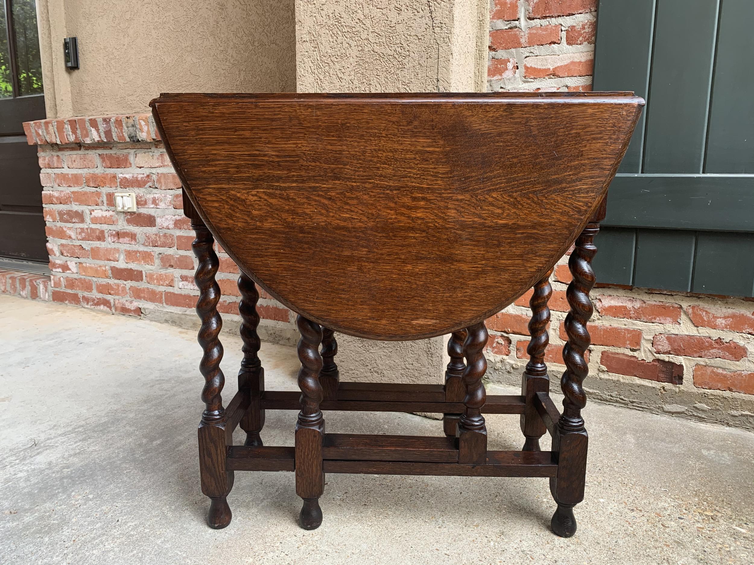 ~Direct from England~
~A beautiful antique English oak gate leg, drop leaf table with British barley twist legs on the table and gate legs~
~It is a versatile small size, perfect for a side or sofa table, also wonderful as a bedside table or a