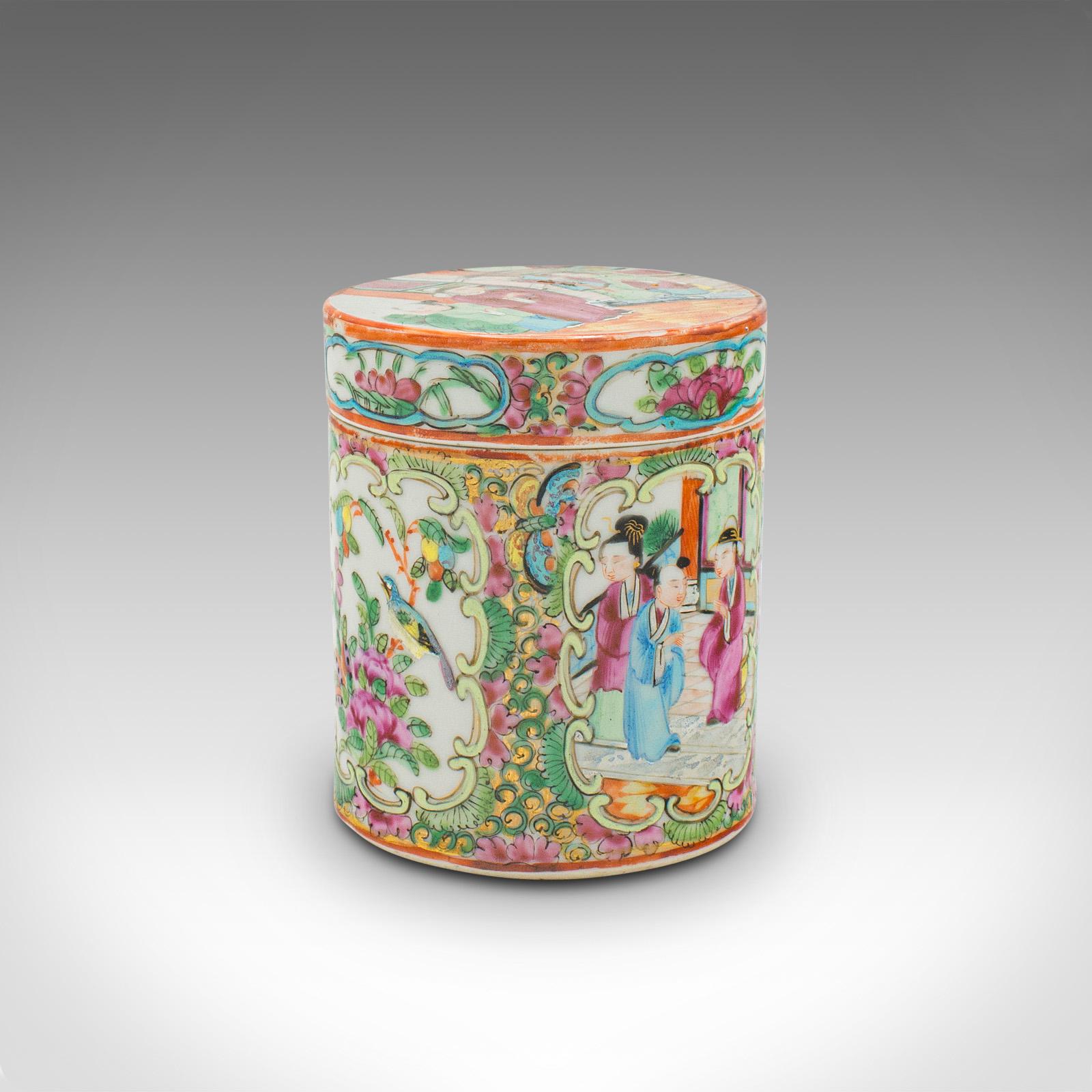 This is a small antique Famille Rose spice jar. A Chinese, hand-painted ceramic decorative pot, dating to the late Victorian period, circa 1900.

Diminutive, but ornately decorative traditional jar
Displays a desirable aged patina and in good