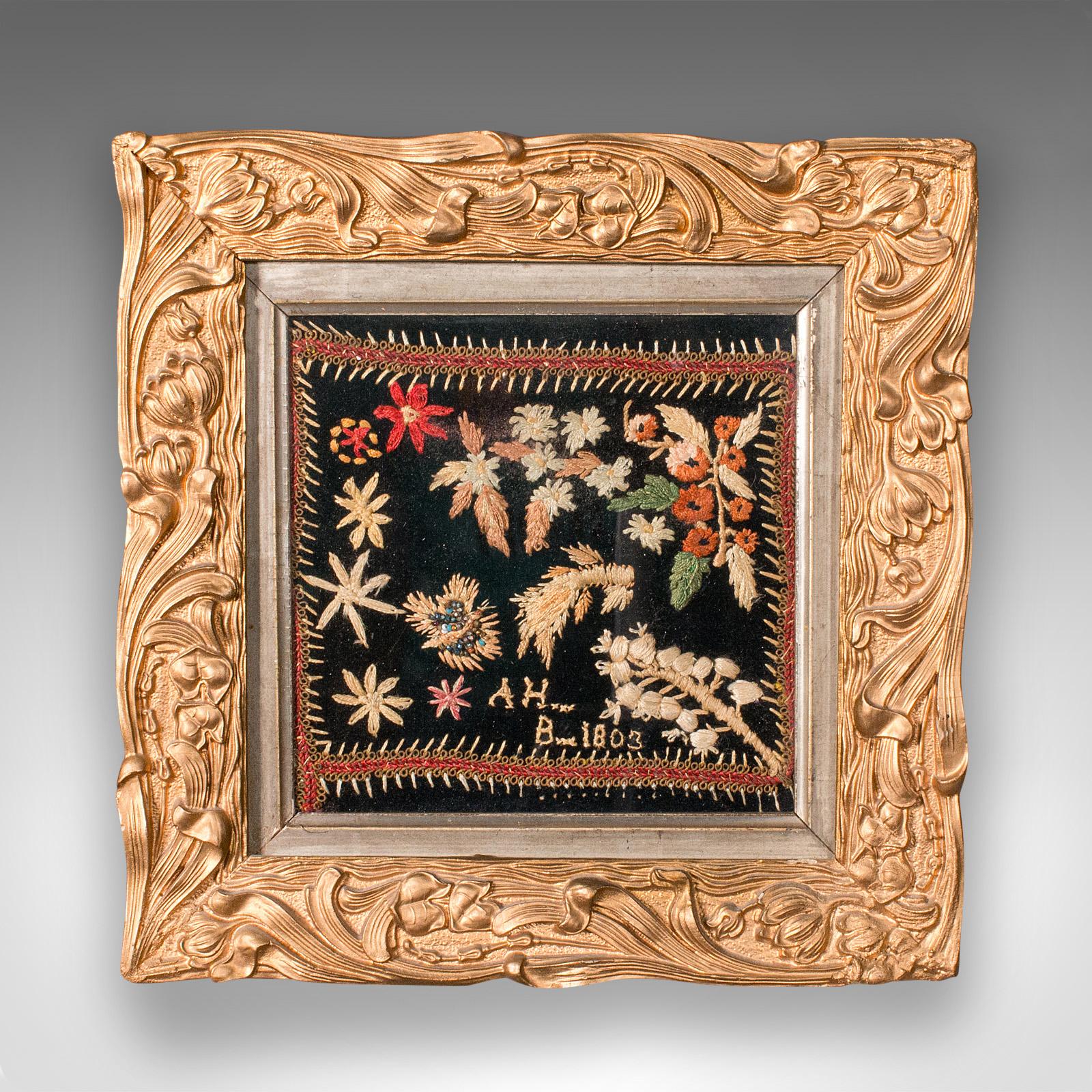 This is an antique framed embroidered sampler. An English, needlepoint tapestry in giltwood frame, dating to the Georgian period, circa 1800 and later.

Delightful antique tapestry, with a wonderfully naive appeal.
Displays a desirable aged