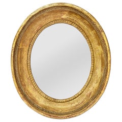 Petit miroir ovale ancien en bois doré français, datant d'environ 1860