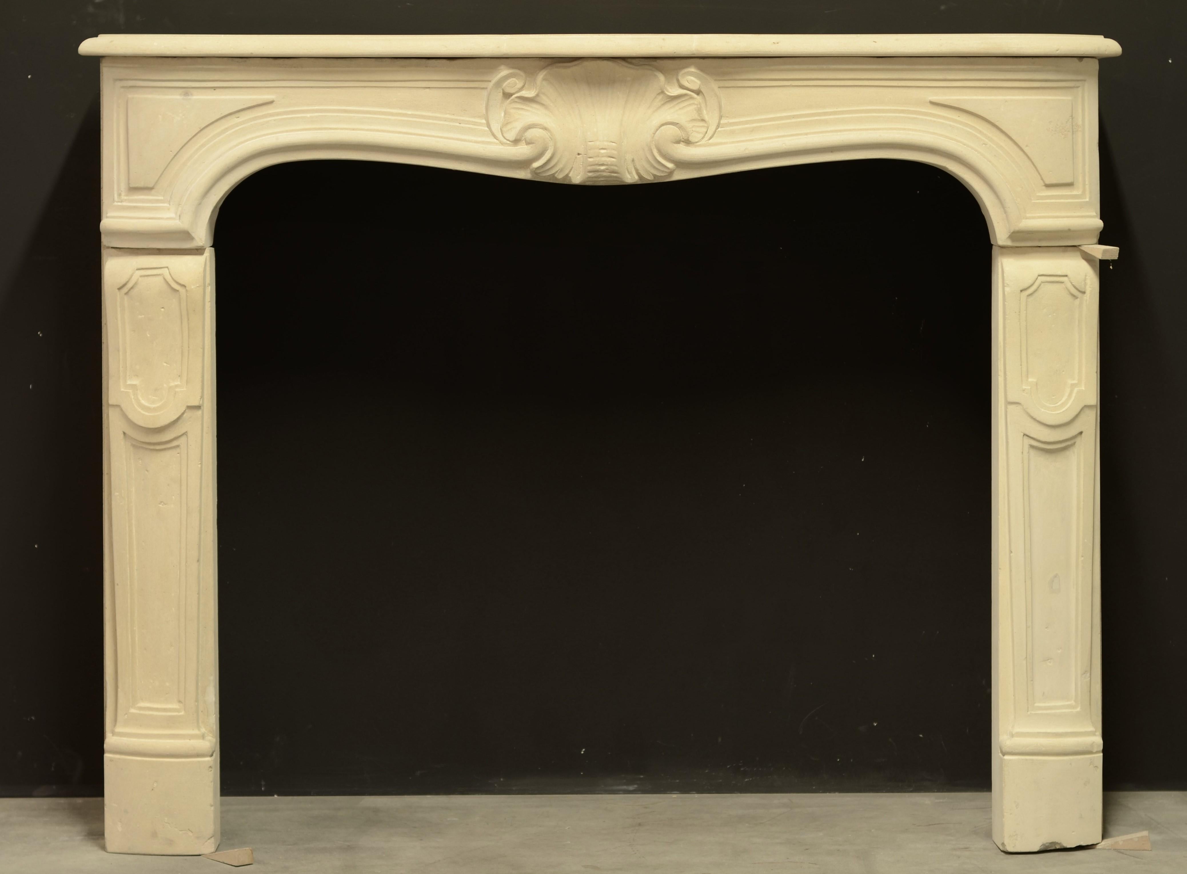 Very nice, small limestone Louis XV from France, 19th century.
Beautiful sweeping frieze with a very detailed and finely carved shell.

The inner dimensions are:
Highest height: 87.5 cm or 34.44 inch
Lowest height (middle) 84 cm. or 33.07