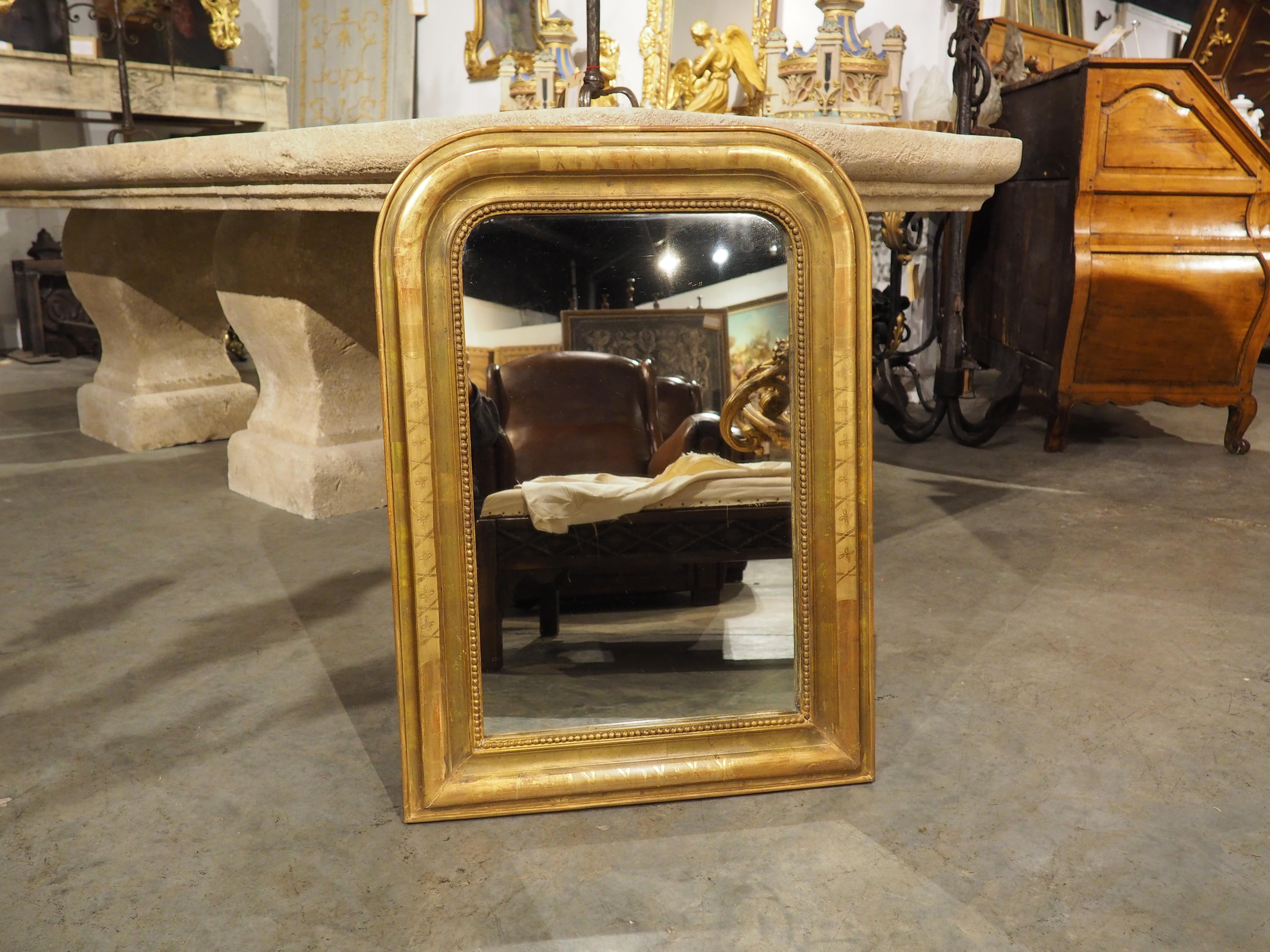 The clean lines and subtle embellishments of Louis Philippe-style mirrors make them highly sought after; they are elegant and versatile furnishings that can be paired with just about any interior design and color palette. This particular offering
