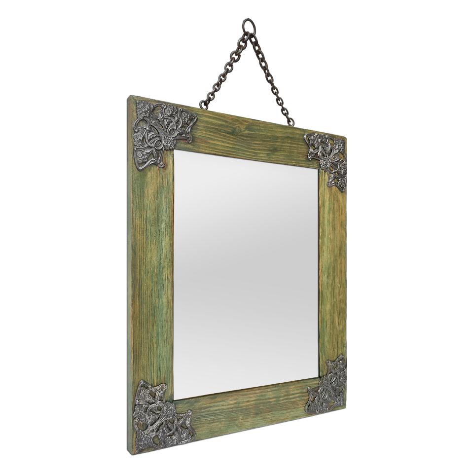 Small French antique mirror in fir wood colored bluish green, Art Nouveau period, circa 1900. Original patina. Decorated with Art Nouveau style metal corners called spandrels. Mirror frame hangs on the wall with an small antique metal chain. (Frame