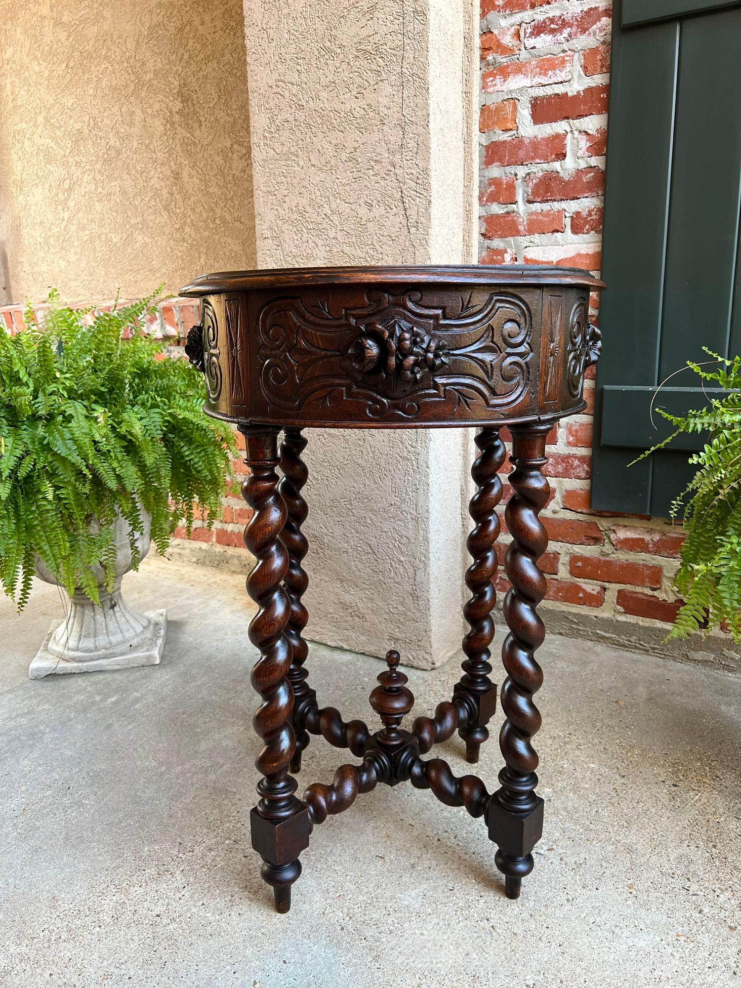 Small Antique French ROUND Center Side TABLE Barley Twist Renaissance Carved Oak.

Direct from France, this SUPER PETITE size round side table, ornately adorned, with an impressive silhouette and design. The beveled edge round oak top and apron are