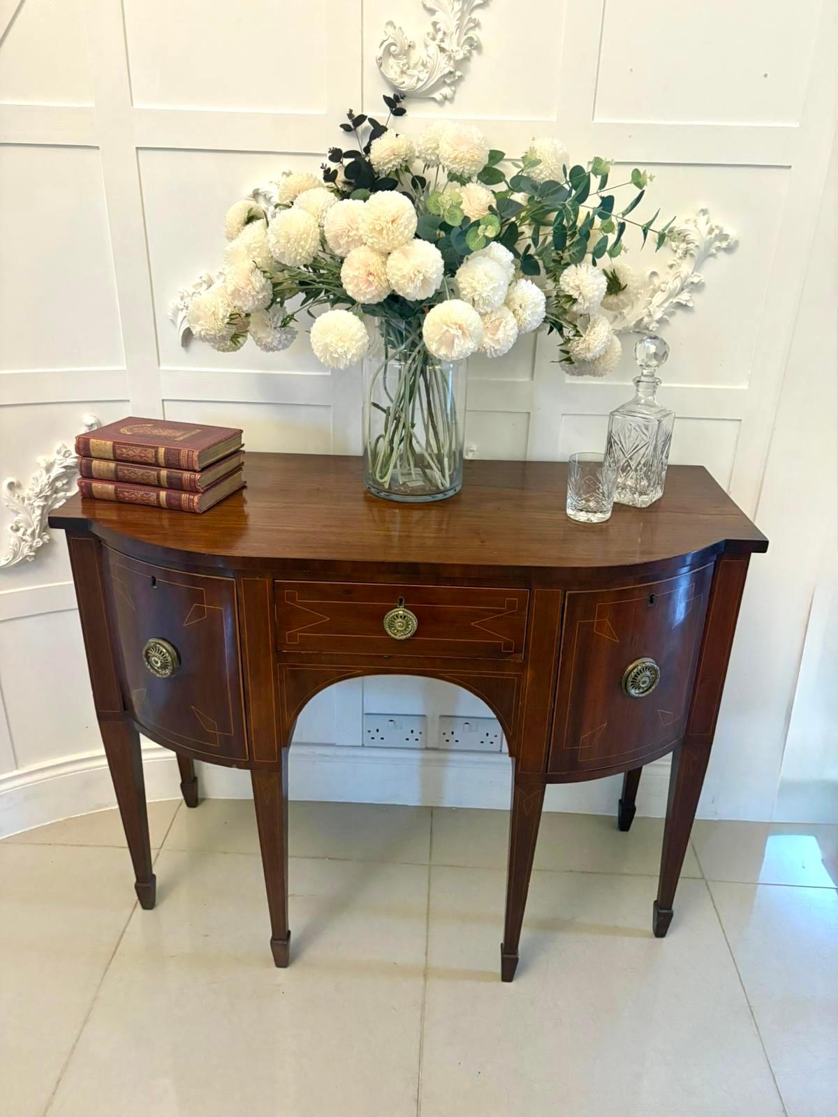 Small Antique George III quality inlaid figured mahogany sideboard having a quality figured mahogany shaped top above a single drawer to the centre with satinwood inlay and original brass handle flanked by two drawers one with the original