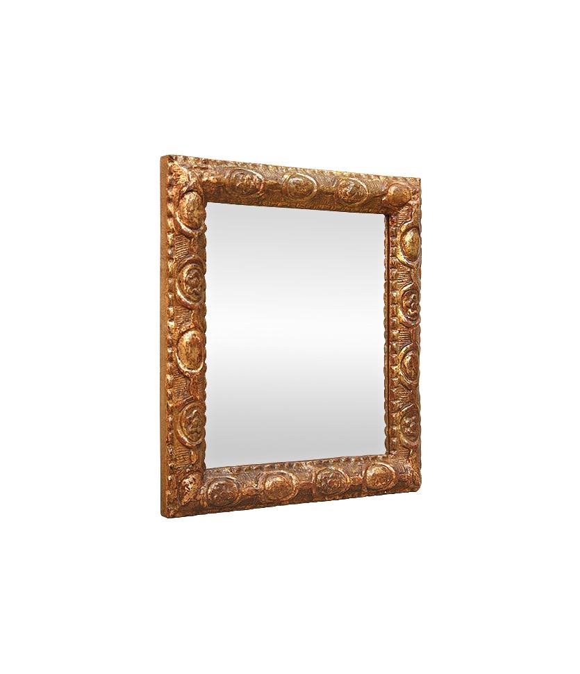 Small French antique mirror, late 18th century. Carved wood Berain style frame on a grooved background. Gold leaf with aged patina. Antique wood back. Antique frame measures: width 1.18 in / 3 cm. Modern mirror glass.