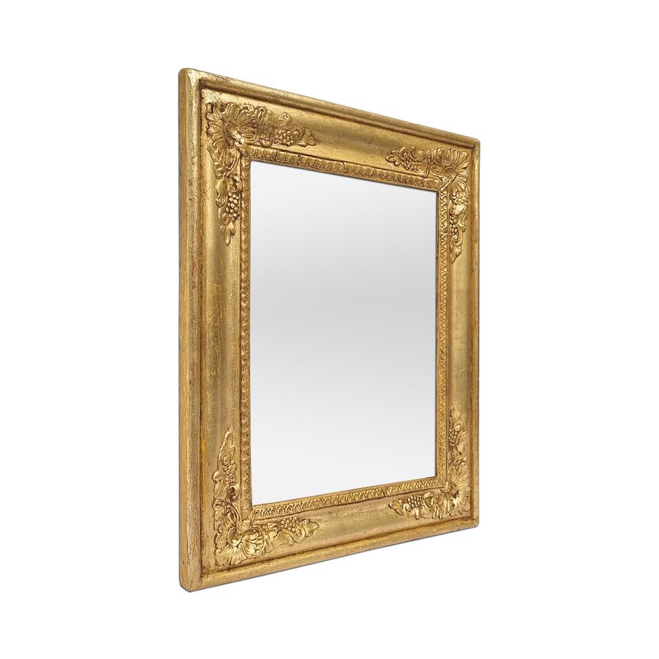 Small French Restauration-style gilded wood mirror, circa 1890. Frame decorated with rais-de-coeur and palmettes in the corners. Antique frame re-gilding with leaf. Frame width: 2.5  cm / 0.98 in. Modern glass mirror. Wood back.