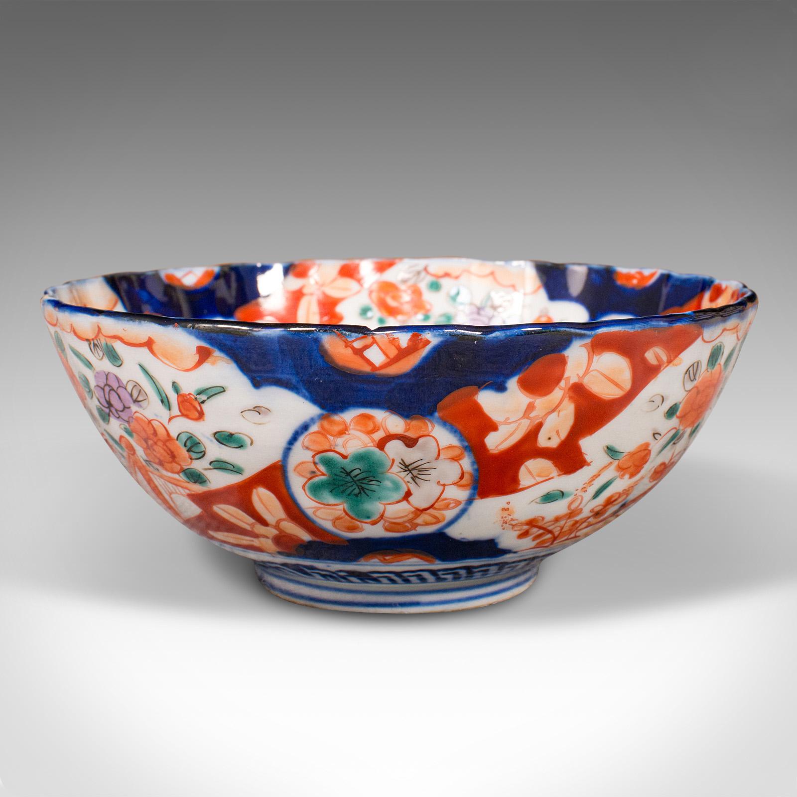 This is a small antique Imari bowl. A Japanese, ceramic decorative dish, dating to the late Victorian period, circa 1900.

Wonderfully colourful example of Imari in delightful bowl form
Displays a desirable aged patina and in good original