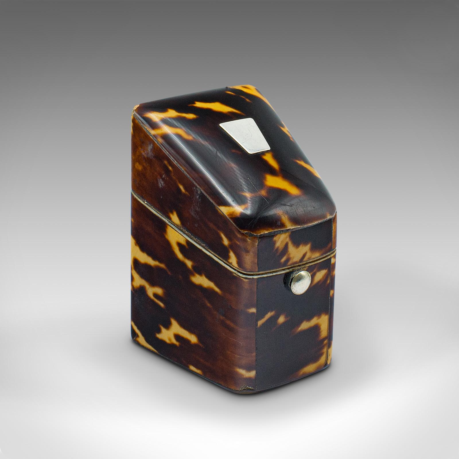
This is a small antique lady's stamp box. An English, faux tortoiseshell case, dating to the Edwardian period, circa 1910.

Charming and petite, offering an elegant home for stamps
Displays a desirable aged patina and in good original