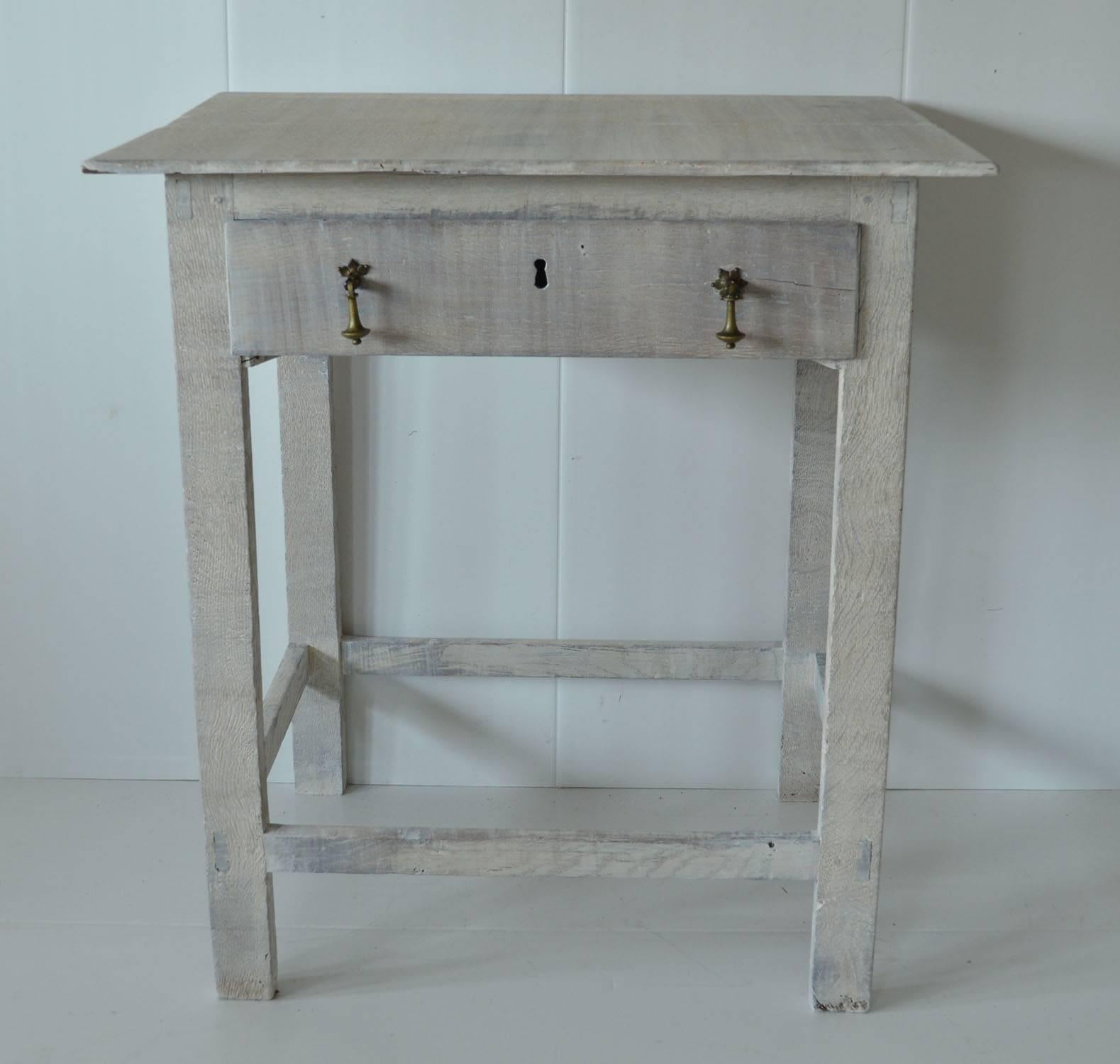 Wonderfully simple limed oak side table.

Single drawer.

Although English it has a Gustavian feel about it.

The piece has been recently limed to enhance the beautiful grain in the oak.


   