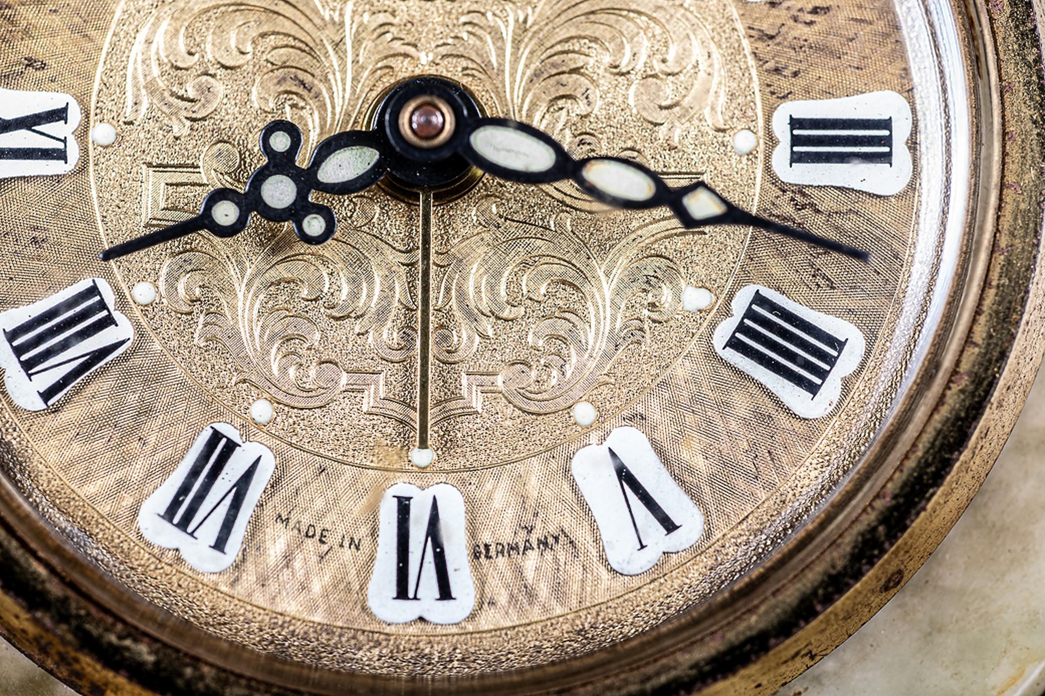 antique small clock