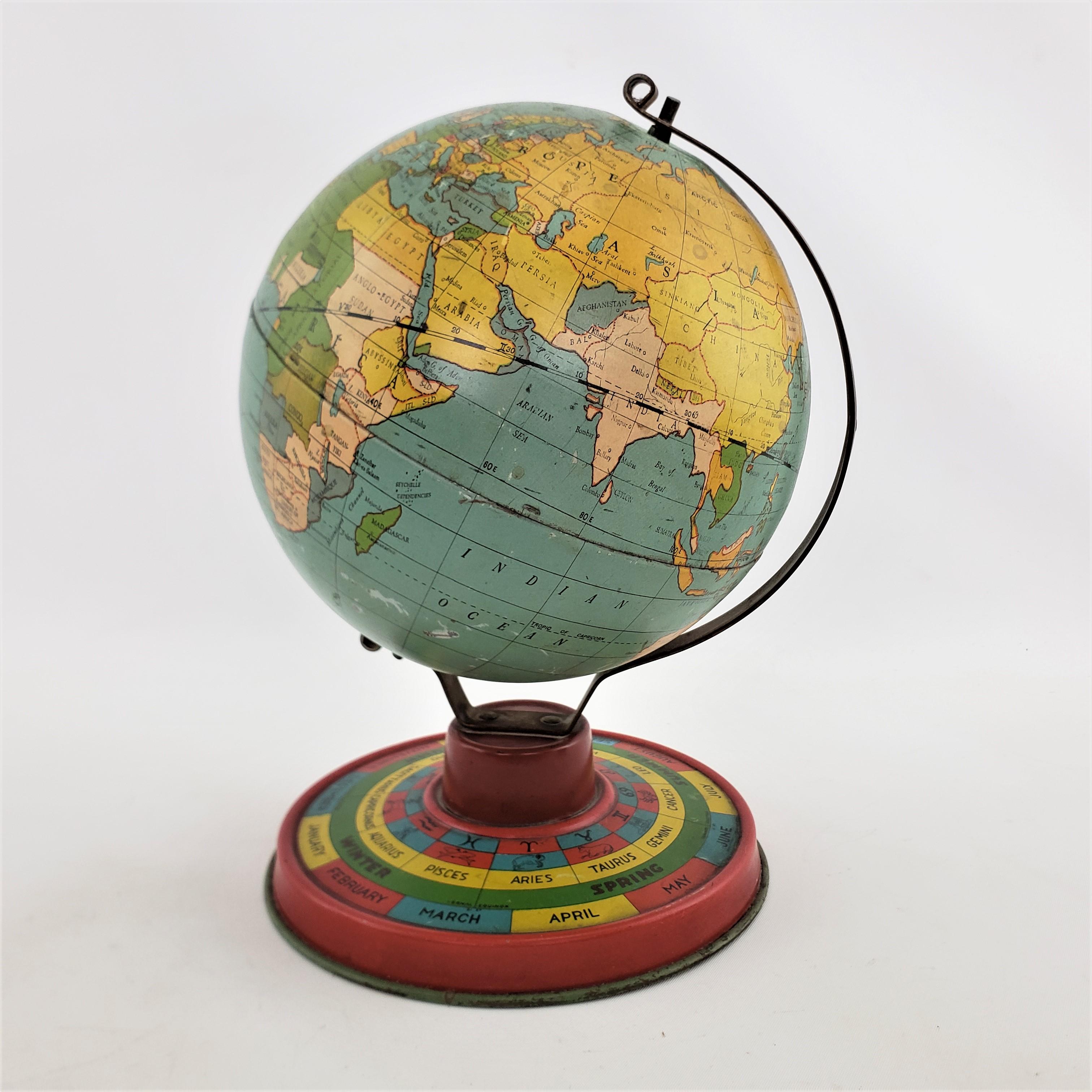 Américain Petit globe terrestre ancien de bureau ou de table en métal surdimensionné avec base lithographiée