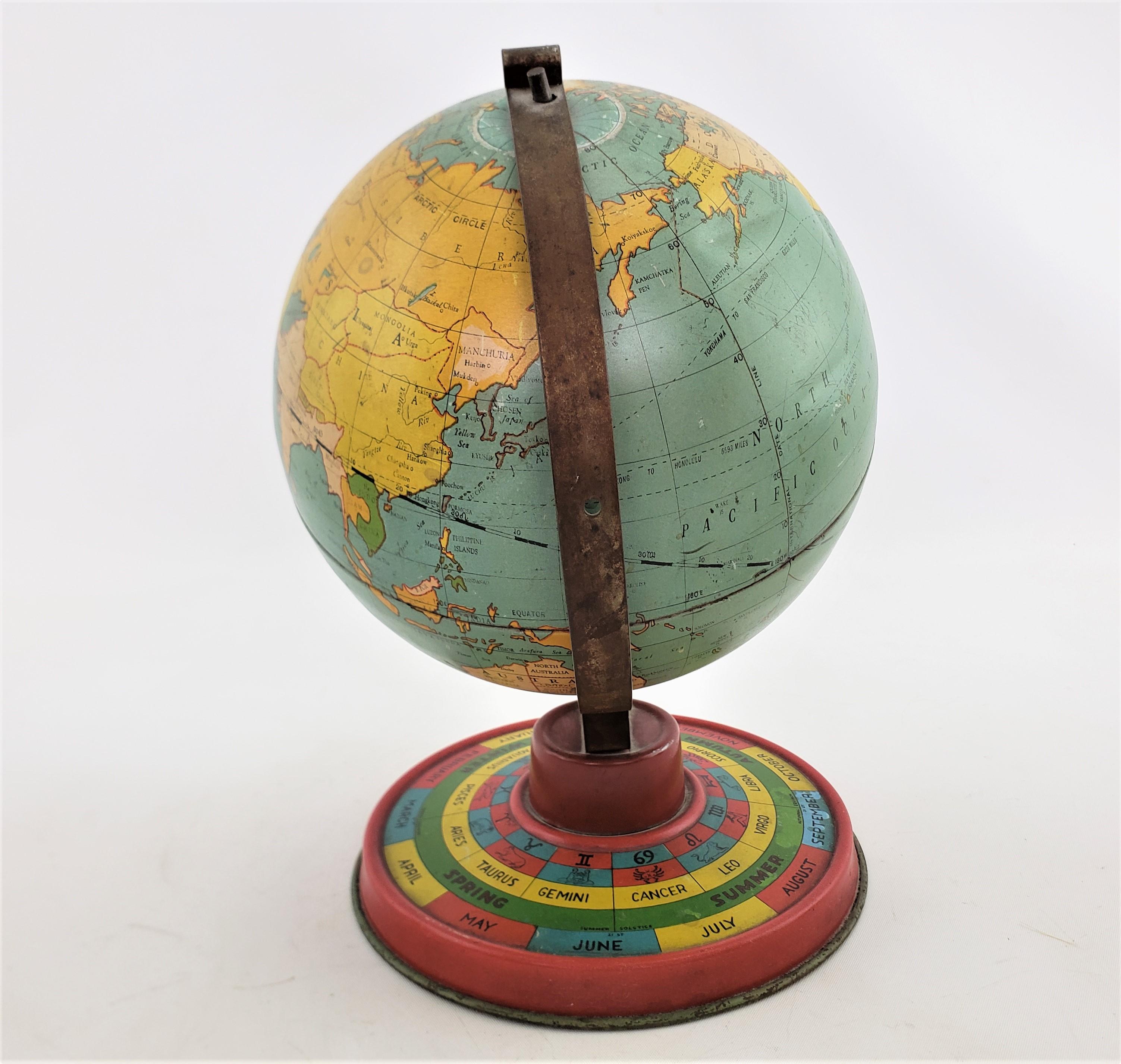 Étain Petit globe terrestre ancien de bureau ou de table en métal surdimensionné avec base lithographiée