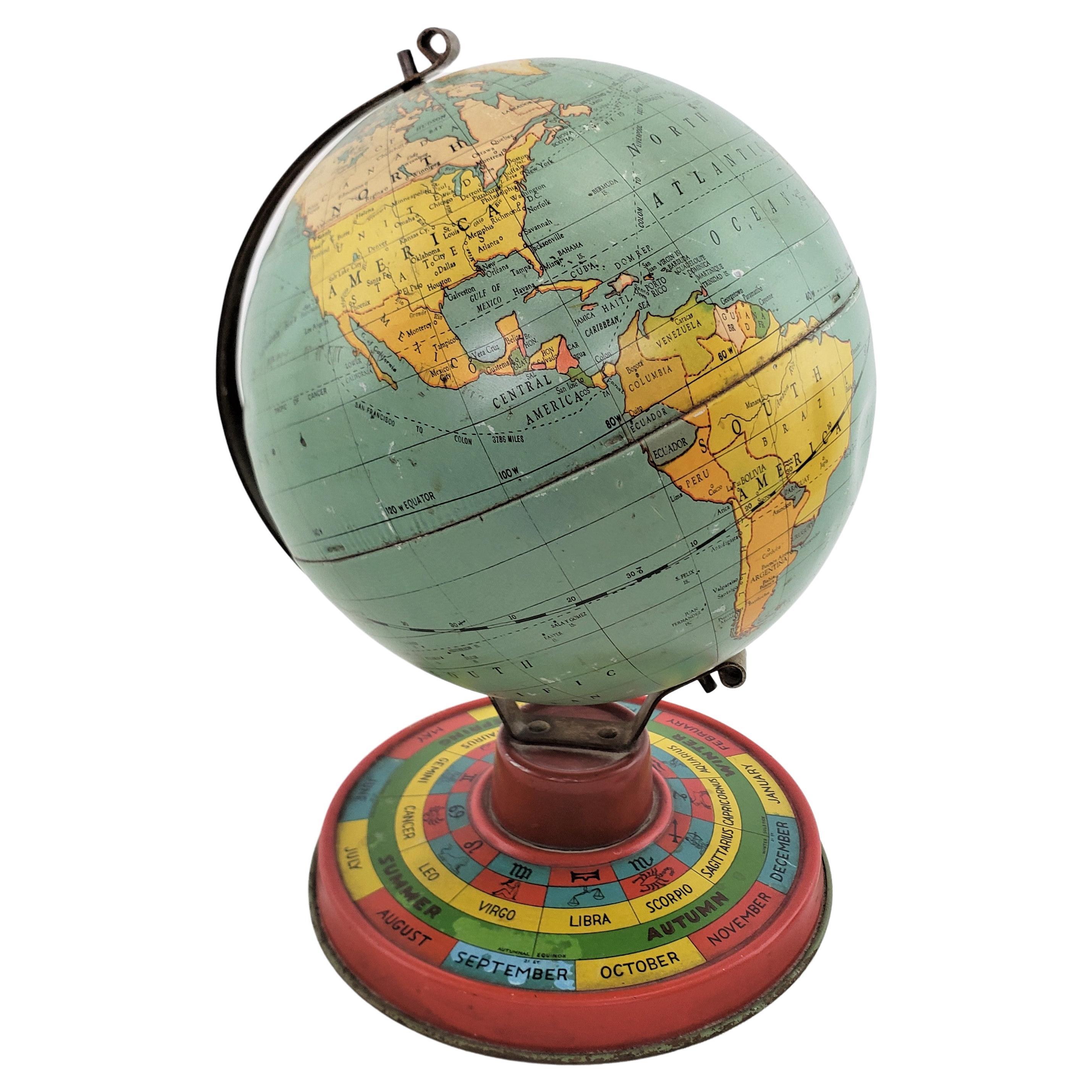 Petit globe terrestre ancien de bureau ou de table en métal surdimensionné avec base lithographiée
