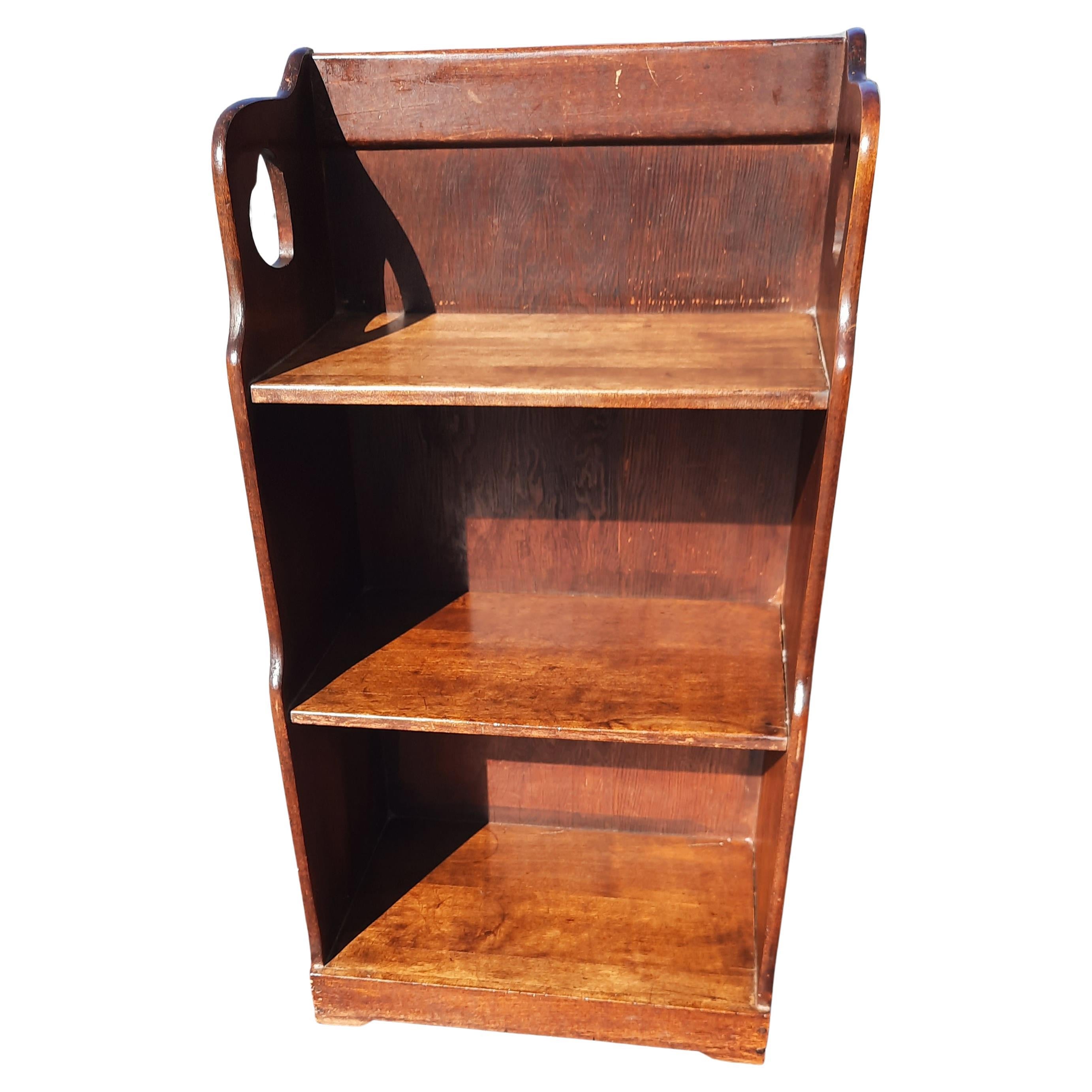 Small antique oak and pine bookcase / etagere. May not hold large books or items, but would make a great decorative piece of furniture in any room in your home. Measures 30