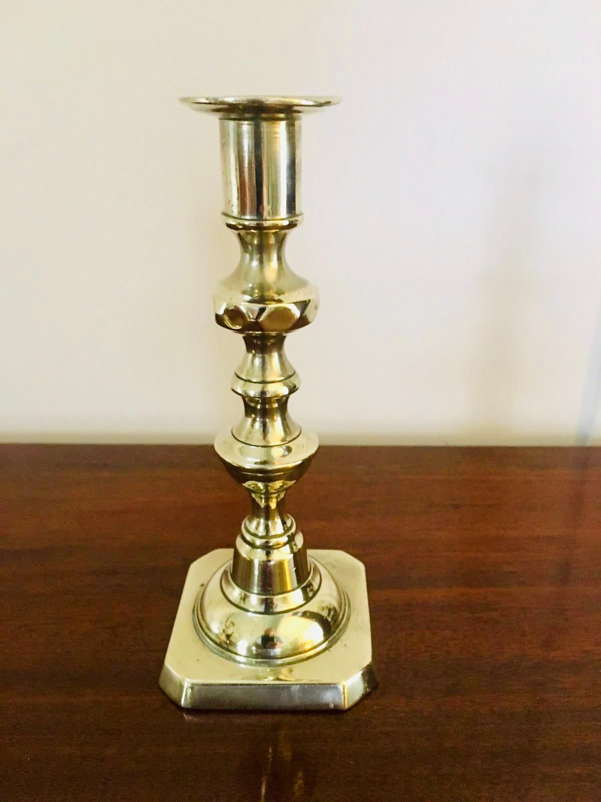 A pair of small antique brass candlesticks having a quaint turned shaped stem. All original
Candle cup depth 4.5cm with 2cm candle width capacity.

  